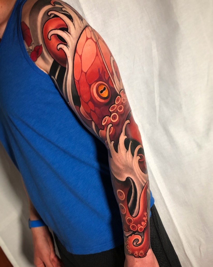 Octopus American traditional tattoo on the forearm by Milo Alfring Tattoo