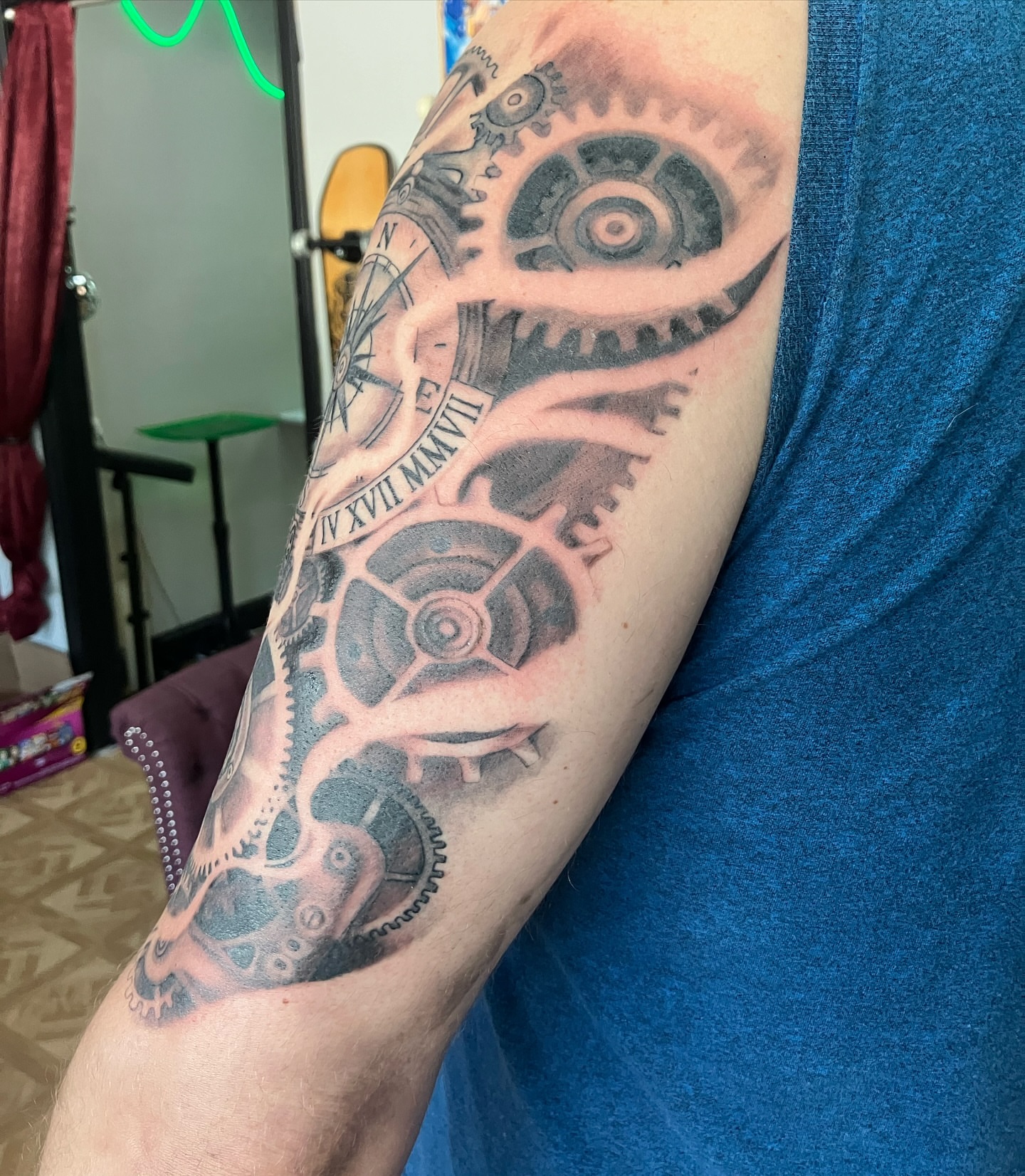 Mechanical gears geometric tattoo on the forearm by Hunter McGinnis