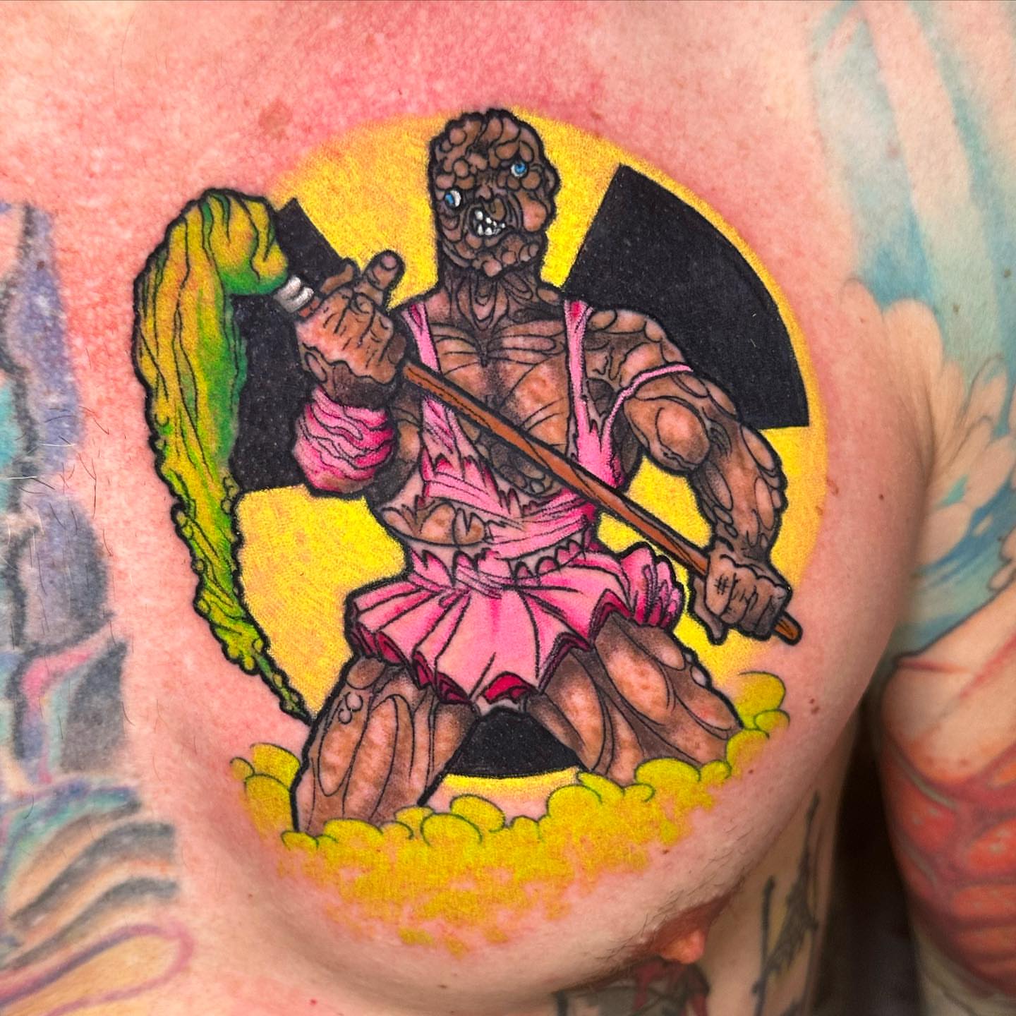 Muscular creature American traditional tattoo on the chest by Marta La Jirafa