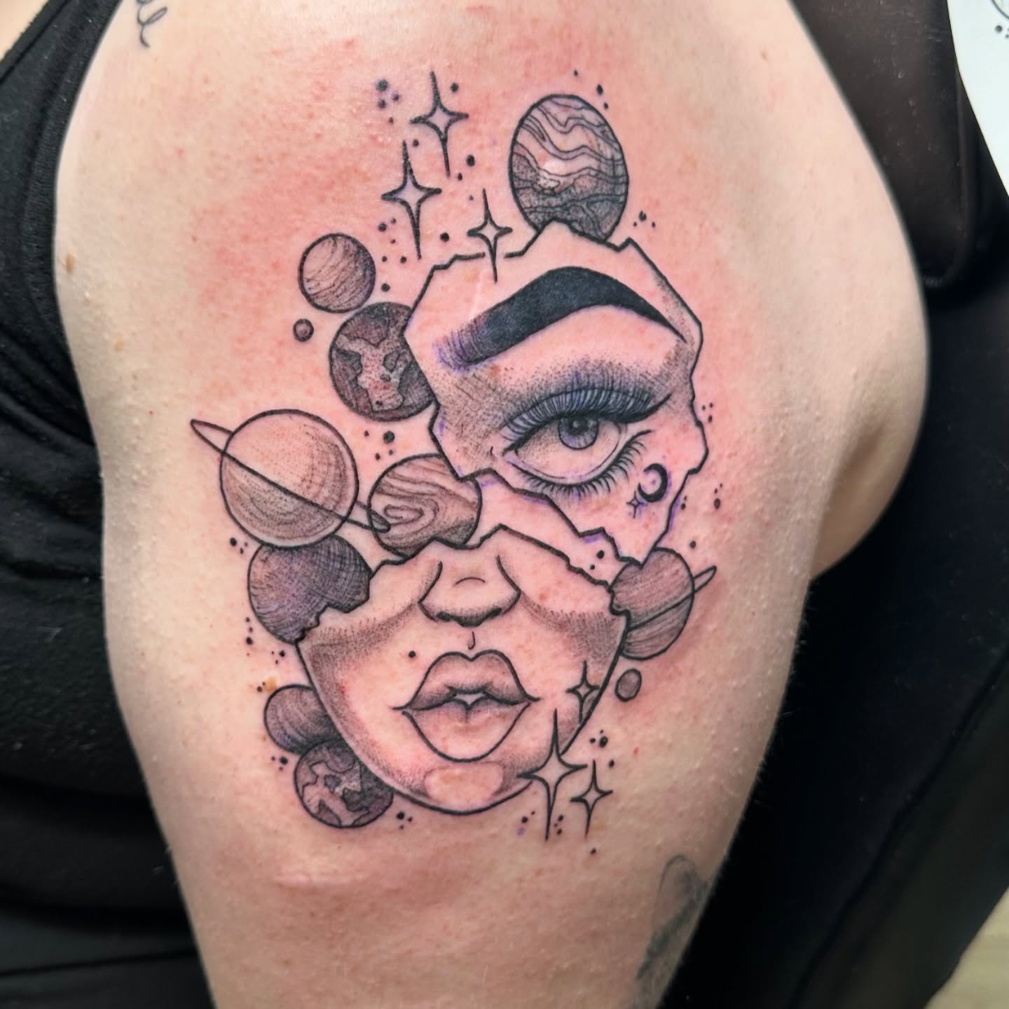 Face with planets dotwork tattoo on the shoulder by Steph ❤️‍🔥 New Jersey Tattoo Artist