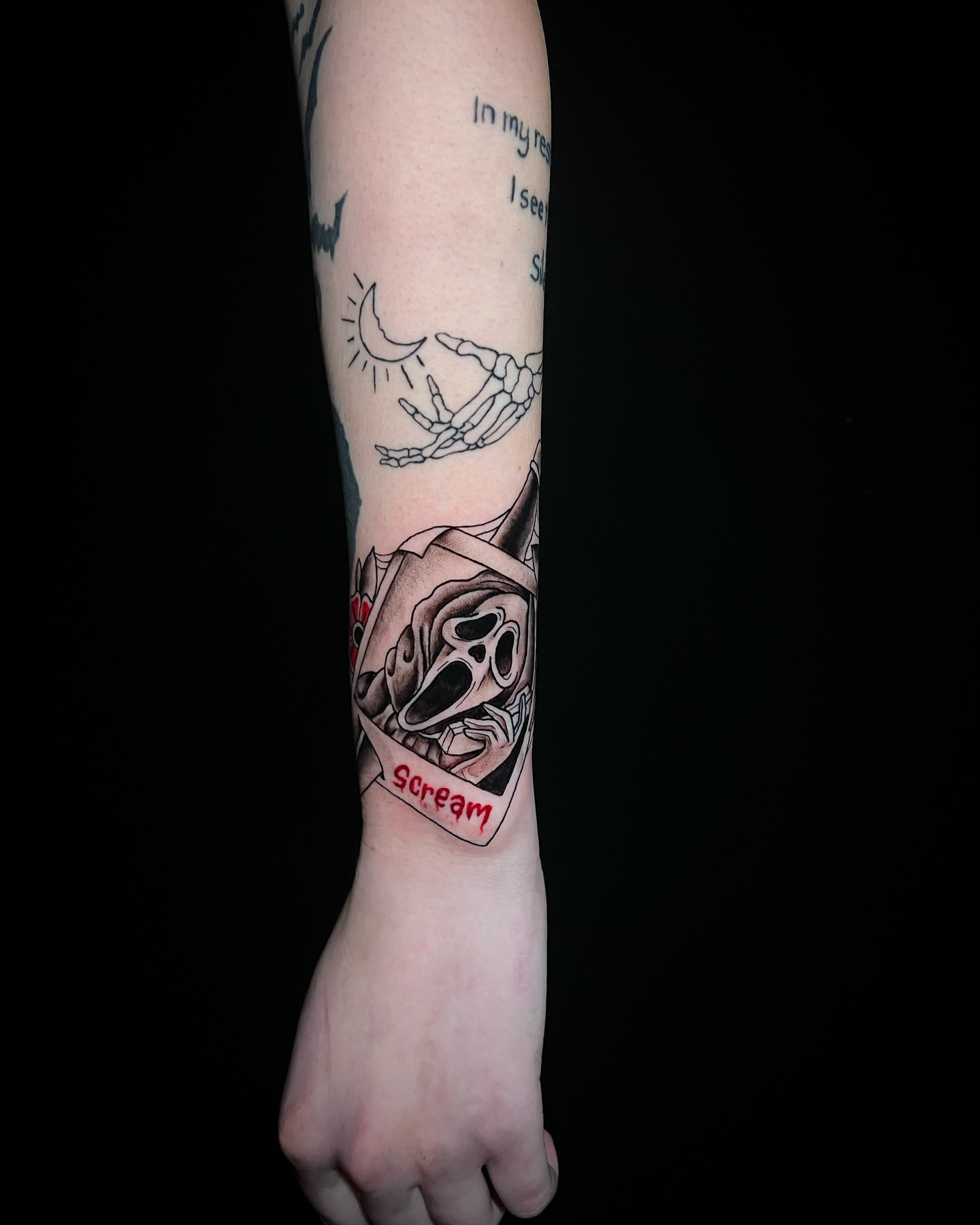 Scream dark realism tattoo on the forearm by MoogieTats
