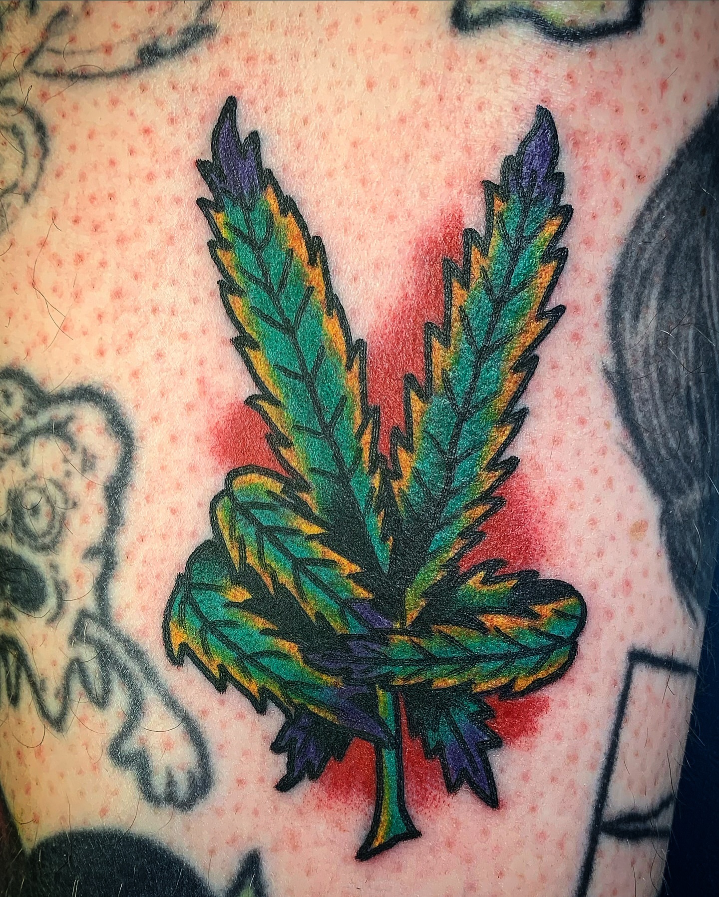 Marijuana leaf new school tattoo by Tattoos Las Vegas,NV