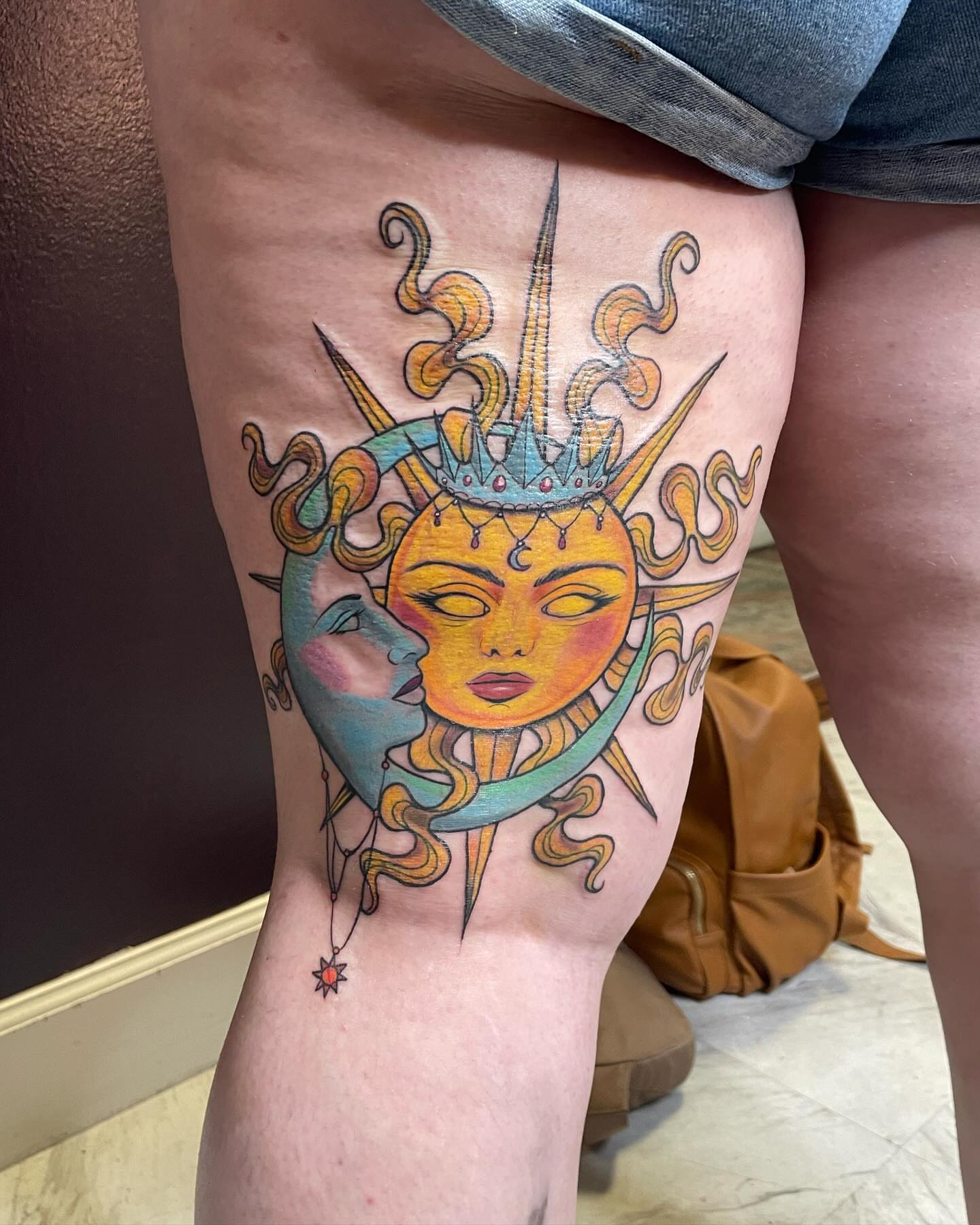 Sun and moon American traditional tattoo on the thigh by Michelle