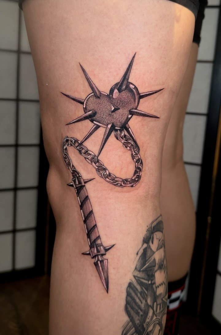 Spiked heart with chain and dagger black and grey tattoo on the thigh by jordyn ๐ญ