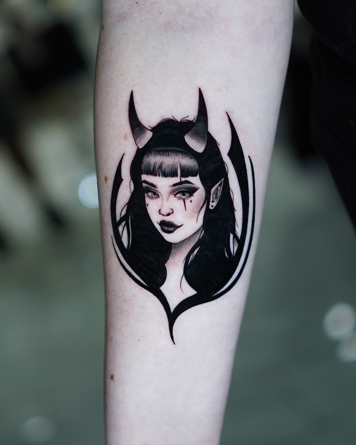 Female character dark realism tattoo on the forearm by Jorden Ruppe
