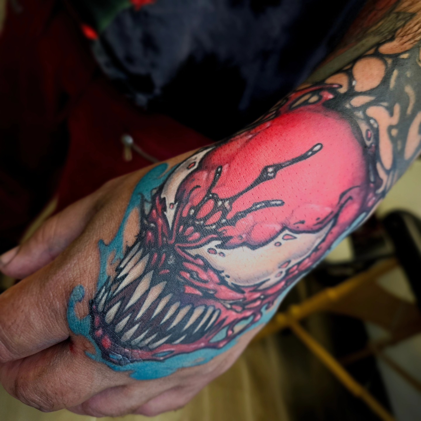 Abstract splatter dotwork tattoo on the forearm by Angell Tattoo Artist, Denver, Colorado