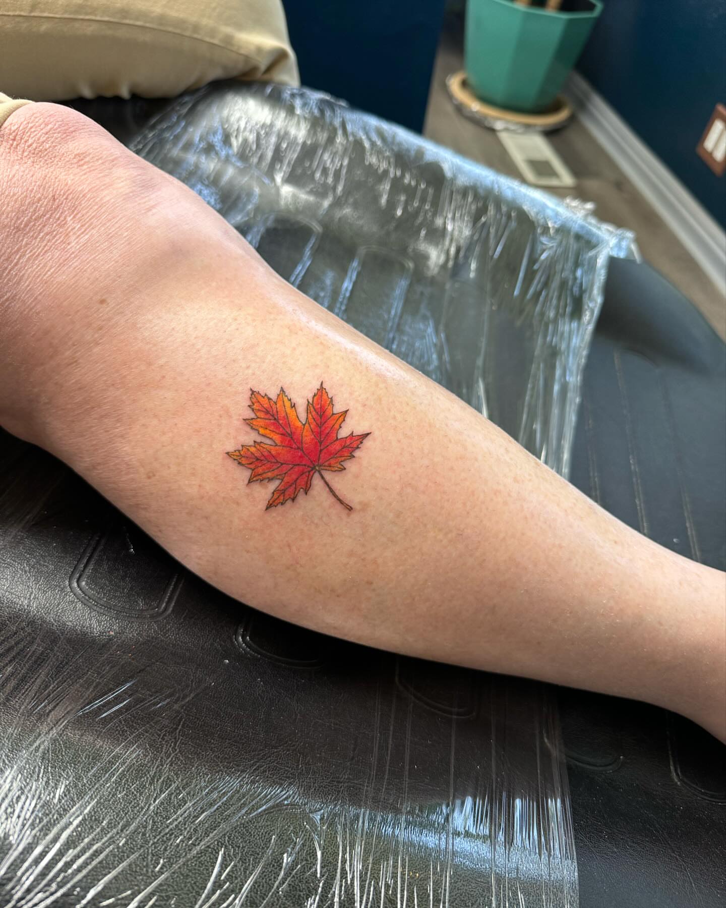 Maple leaf realism tattoo on the forearm by Robyn Mahon
