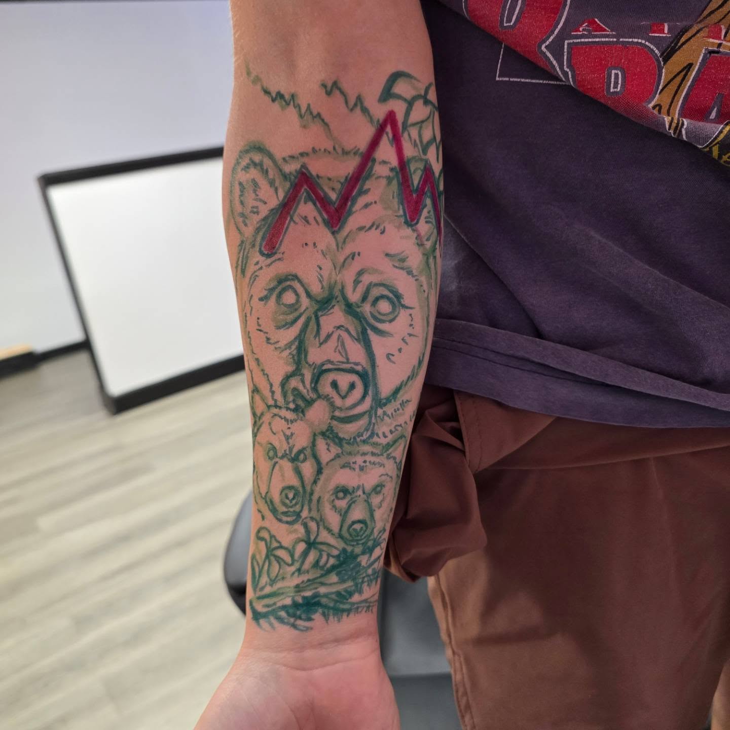 Bear family American traditional tattoo on the forearm by Gene Britton