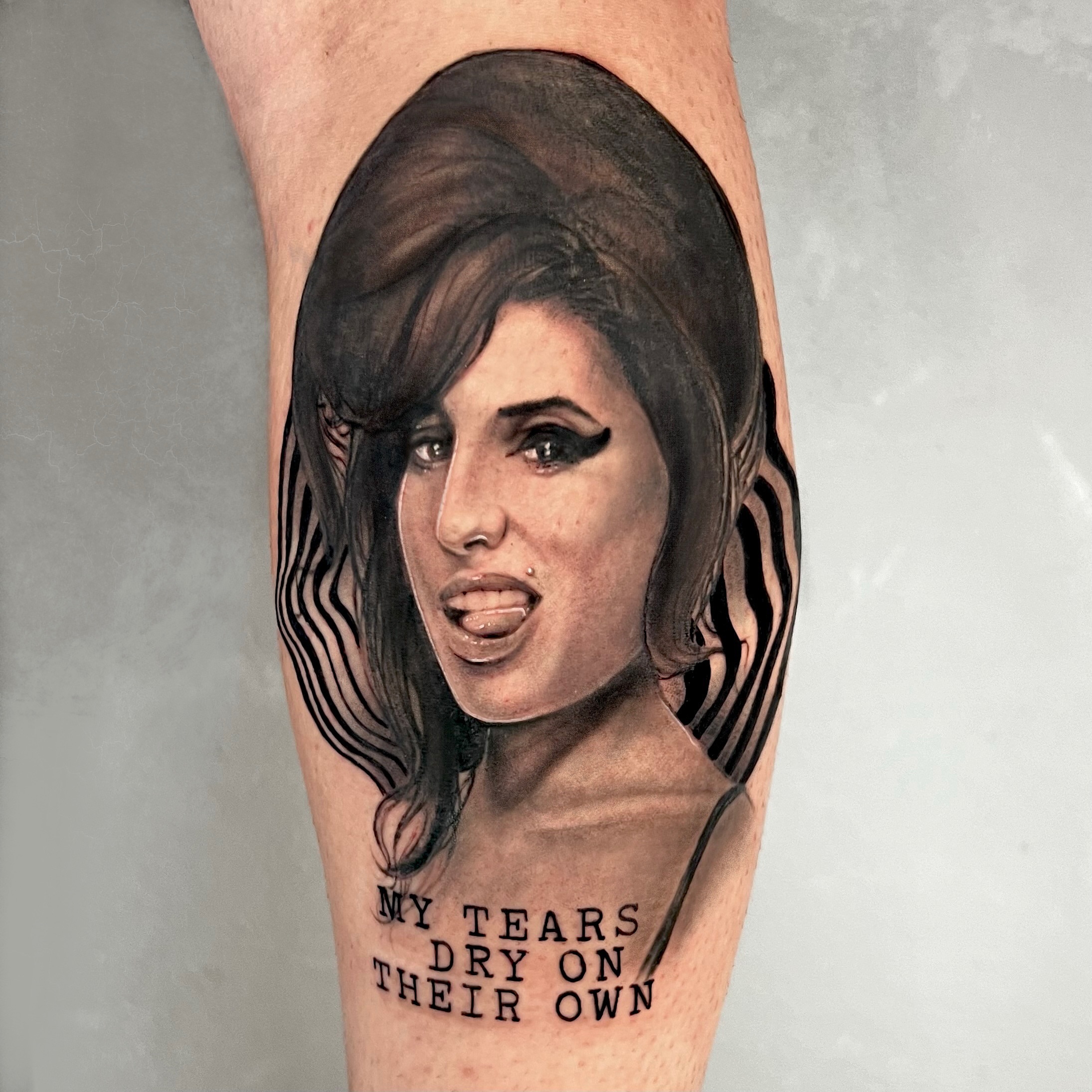 Amy winehouse realism tattoo on the forearm by Milk Tattoos 🇸🇻🇪🇸