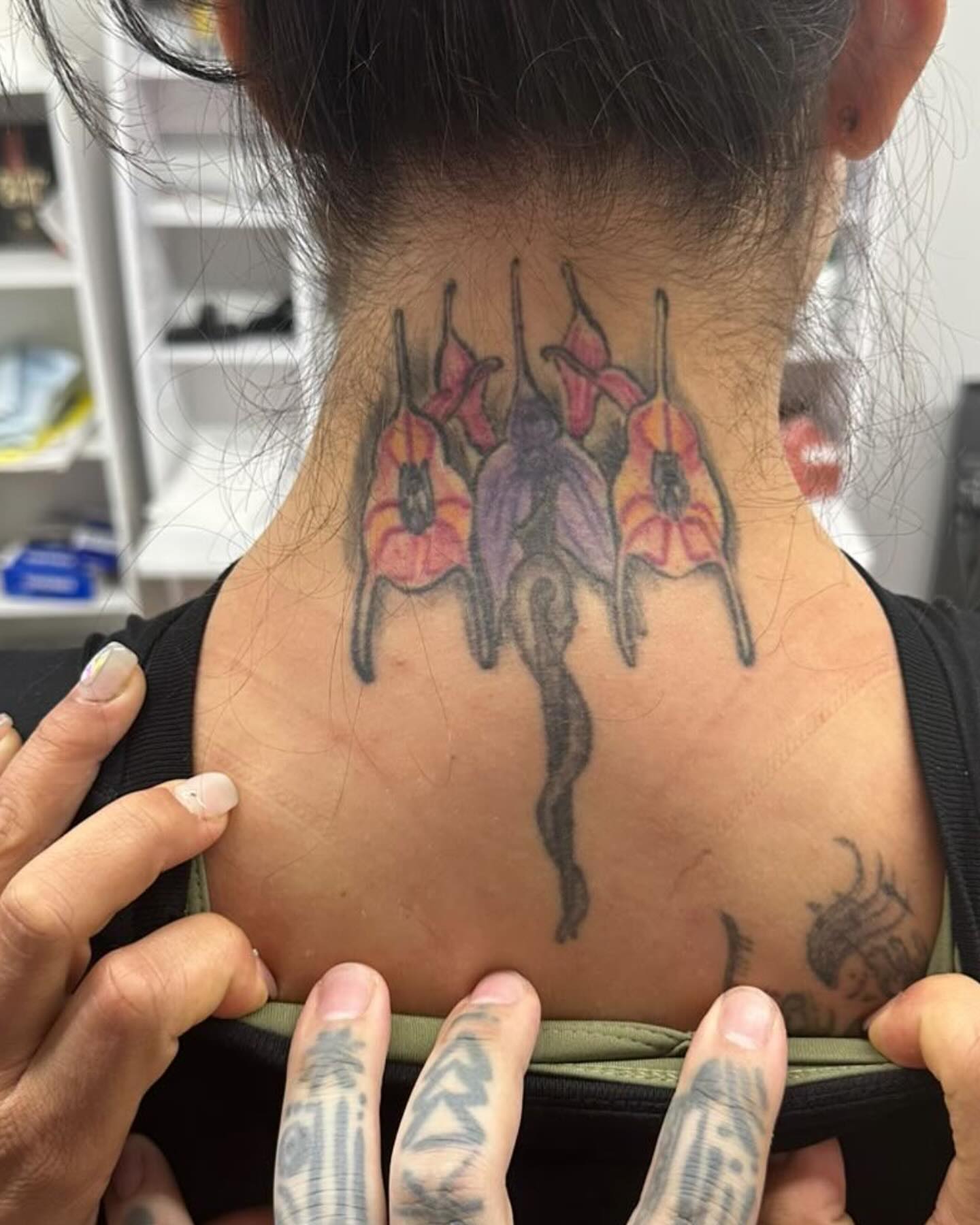 Flowers black and grey tattoo on the neck by ⠀Joey Rosado