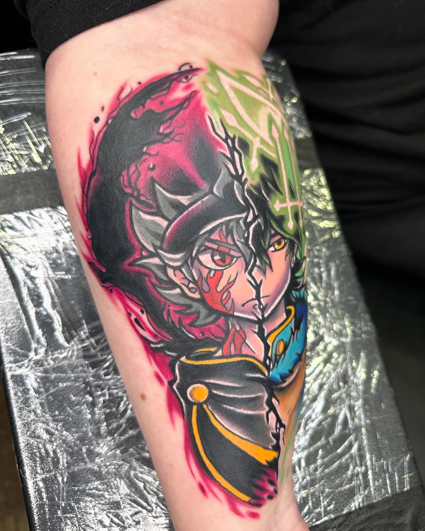 Anime character anime tattoo on the forearm by Jeremy Thomas
