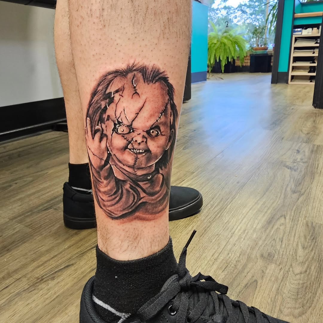Chucky doll realism tattoo on the calf by @stevison15