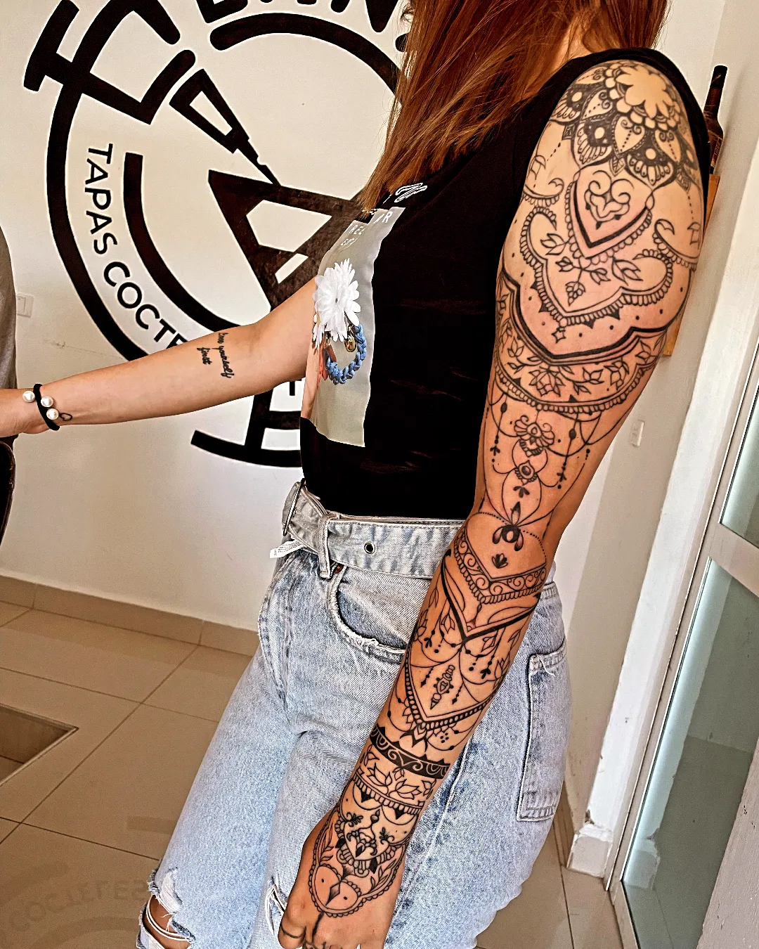 Mandala geometric tattoo on the upper arm by Gabriel Garcia