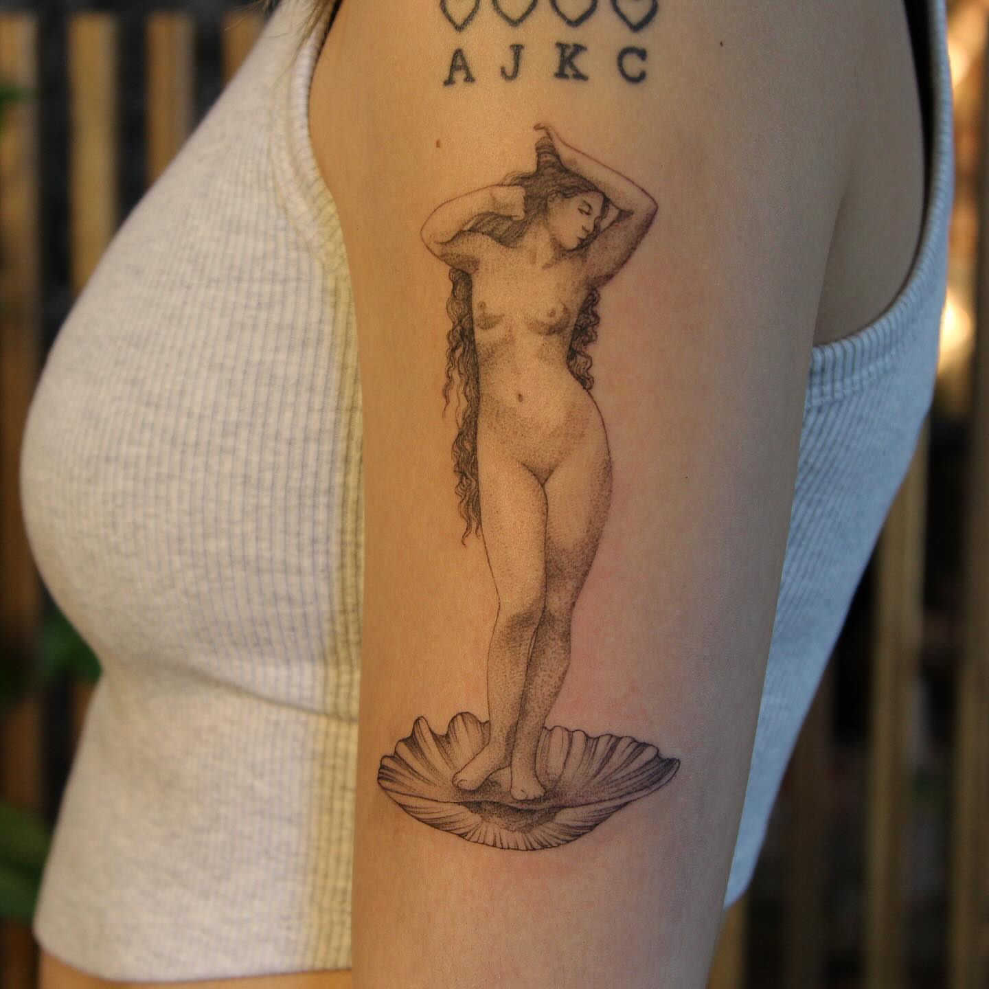 Tattoo by @rubytiiger — black_and_grey, realism