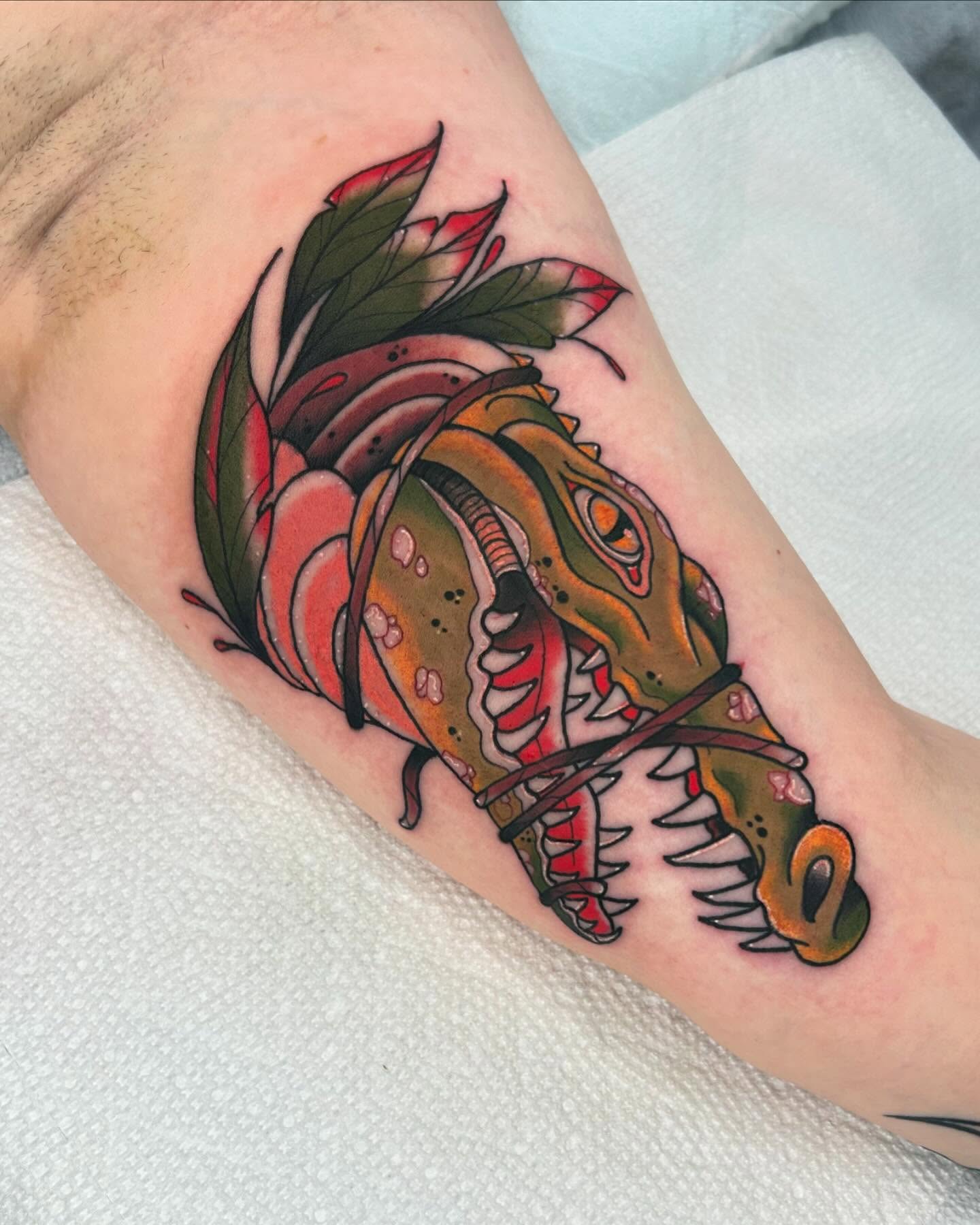 Fish American traditional tattoo on the forearm by Noah Crow