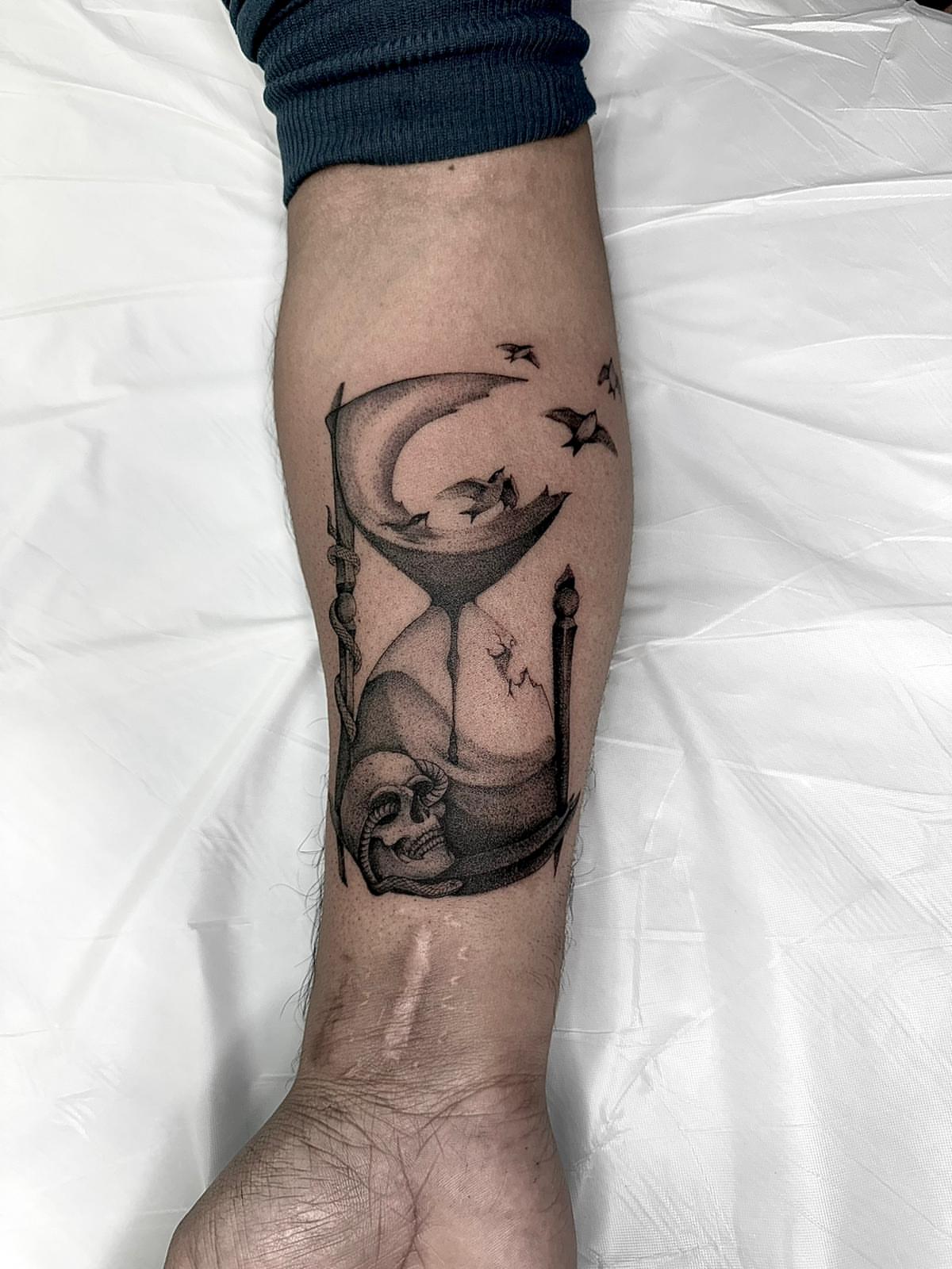 Moon and woman realism tattoo on the forearm by Ninna