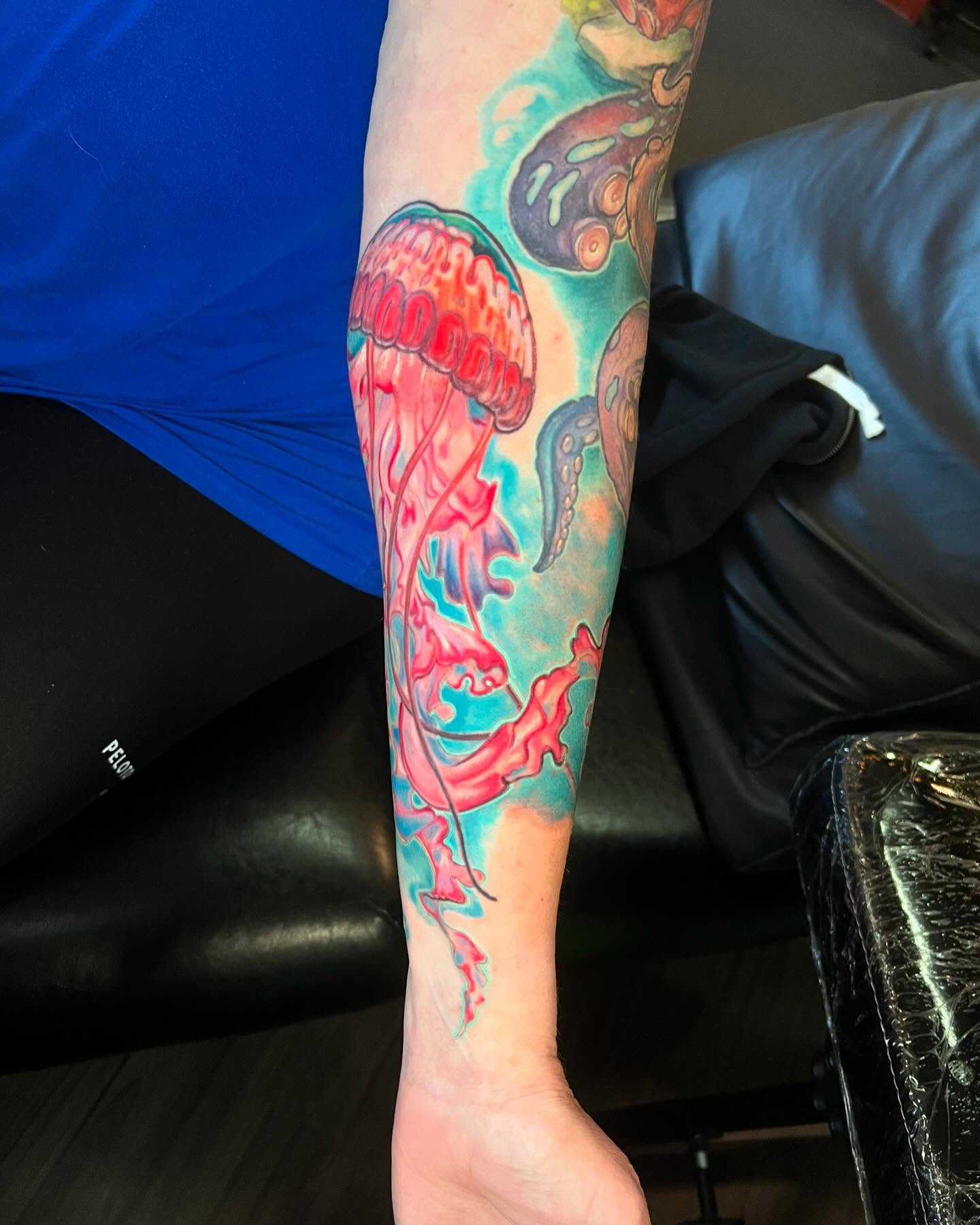 Jellyfish new school tattoo on the forearm by Josh Green