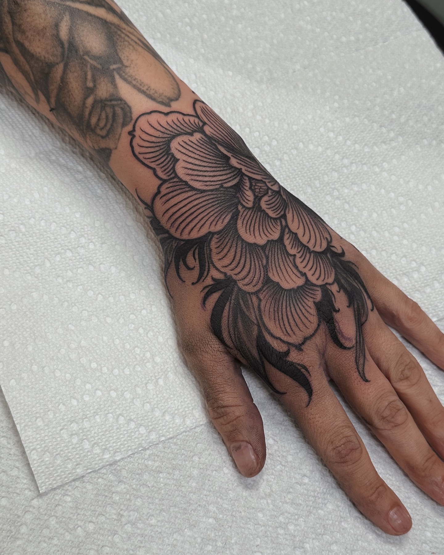 Peony black and grey tattoo on the hand by abigail 🌸