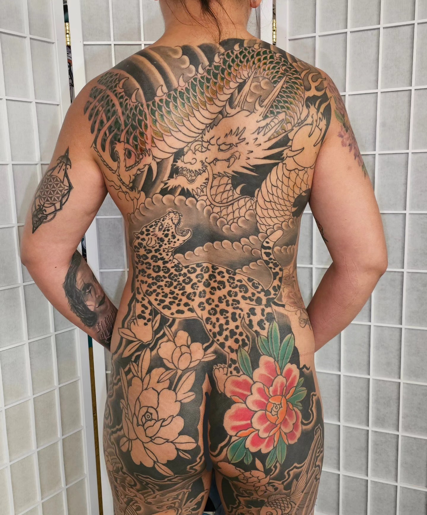 Dragon and leopard japanese irezumi tattoo on the back by Avelourd Legaspi