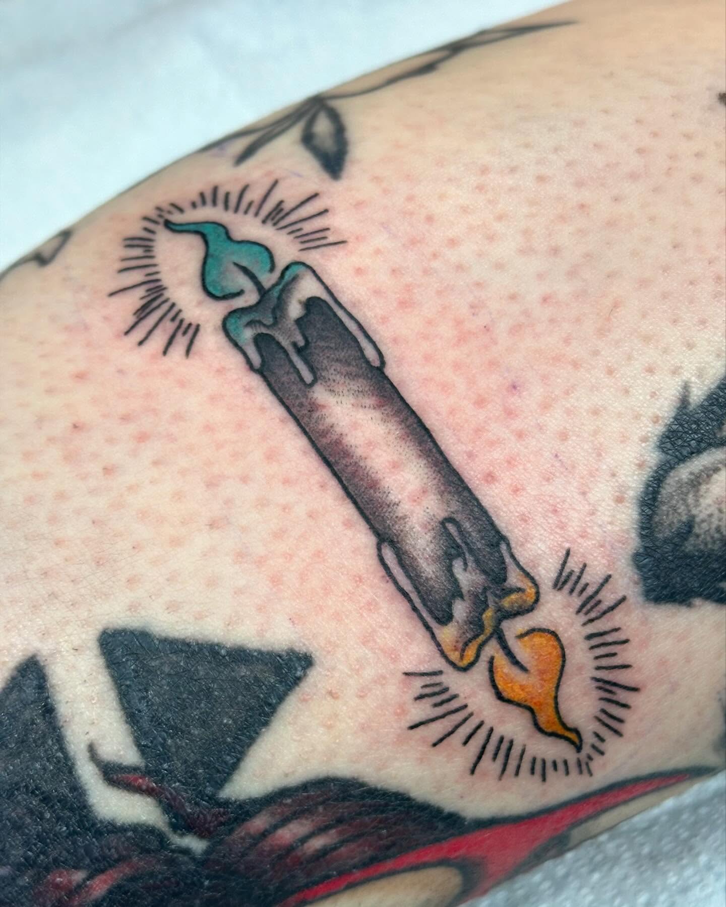 Candle American traditional tattoo on the forearm by hannah vertal