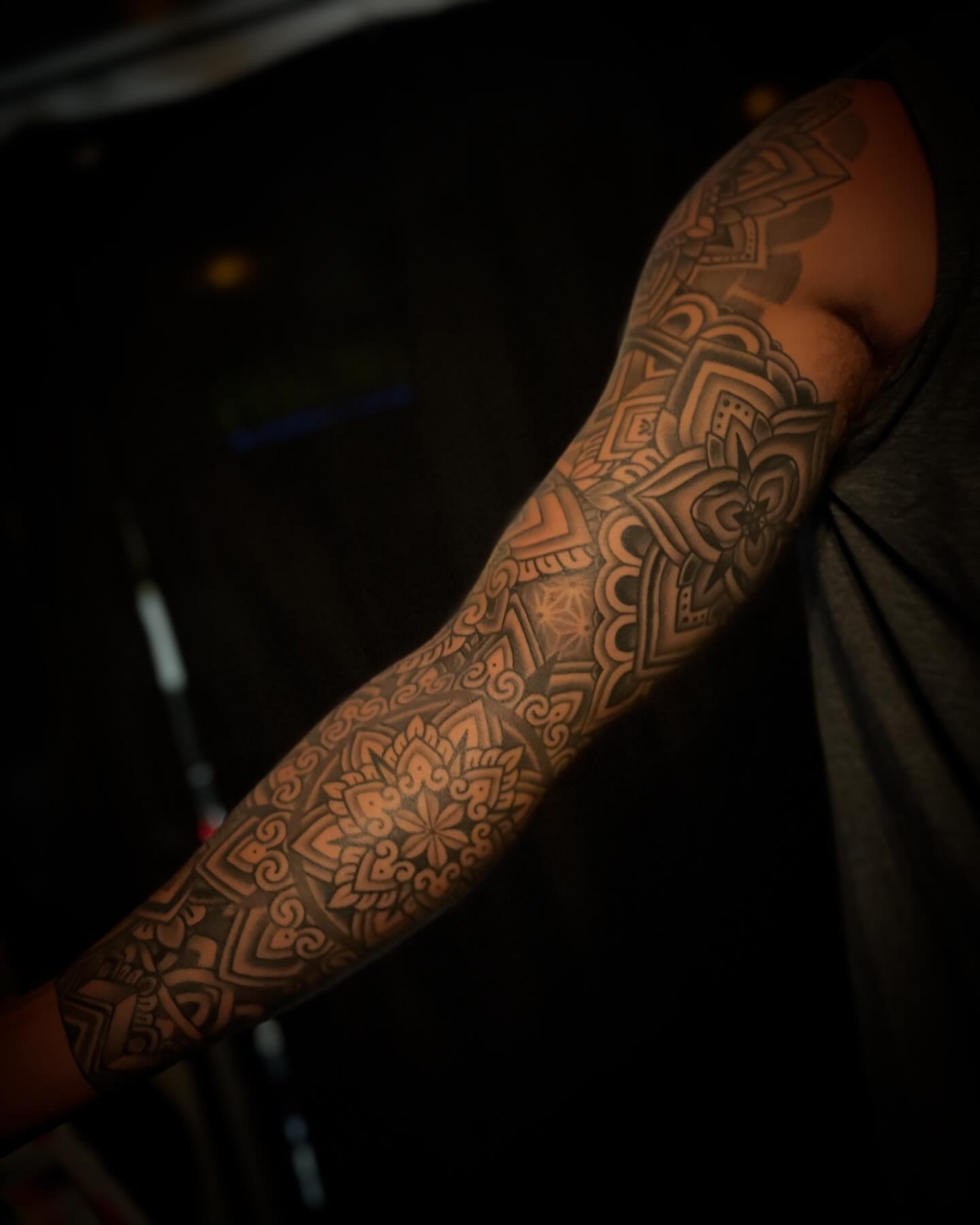 Floral mandala geometric tattoo on the forearm by Jacob Finelli
