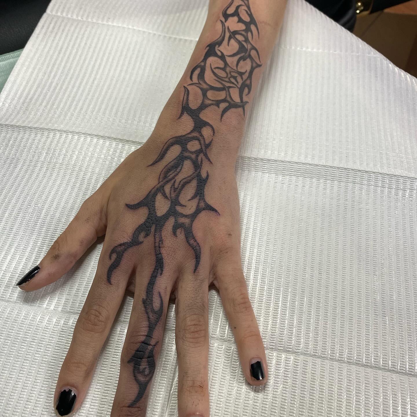 Tribal flame tribal tattoo on the hand by Maddy ⁂, Murfreesboro, Tennessee