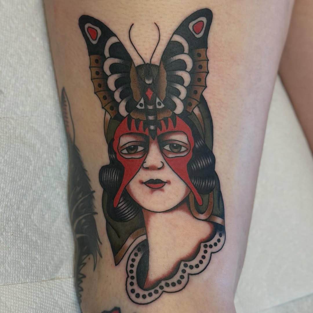 Woman with butterfly mask neo-traditional tattoo on the forearm by @ryleecoyote, New York, New York