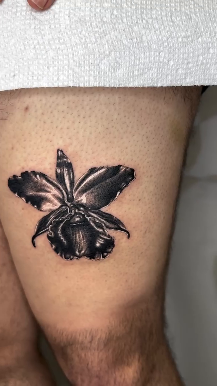 Orchid realism tattoo by Mystikal Blue Casares