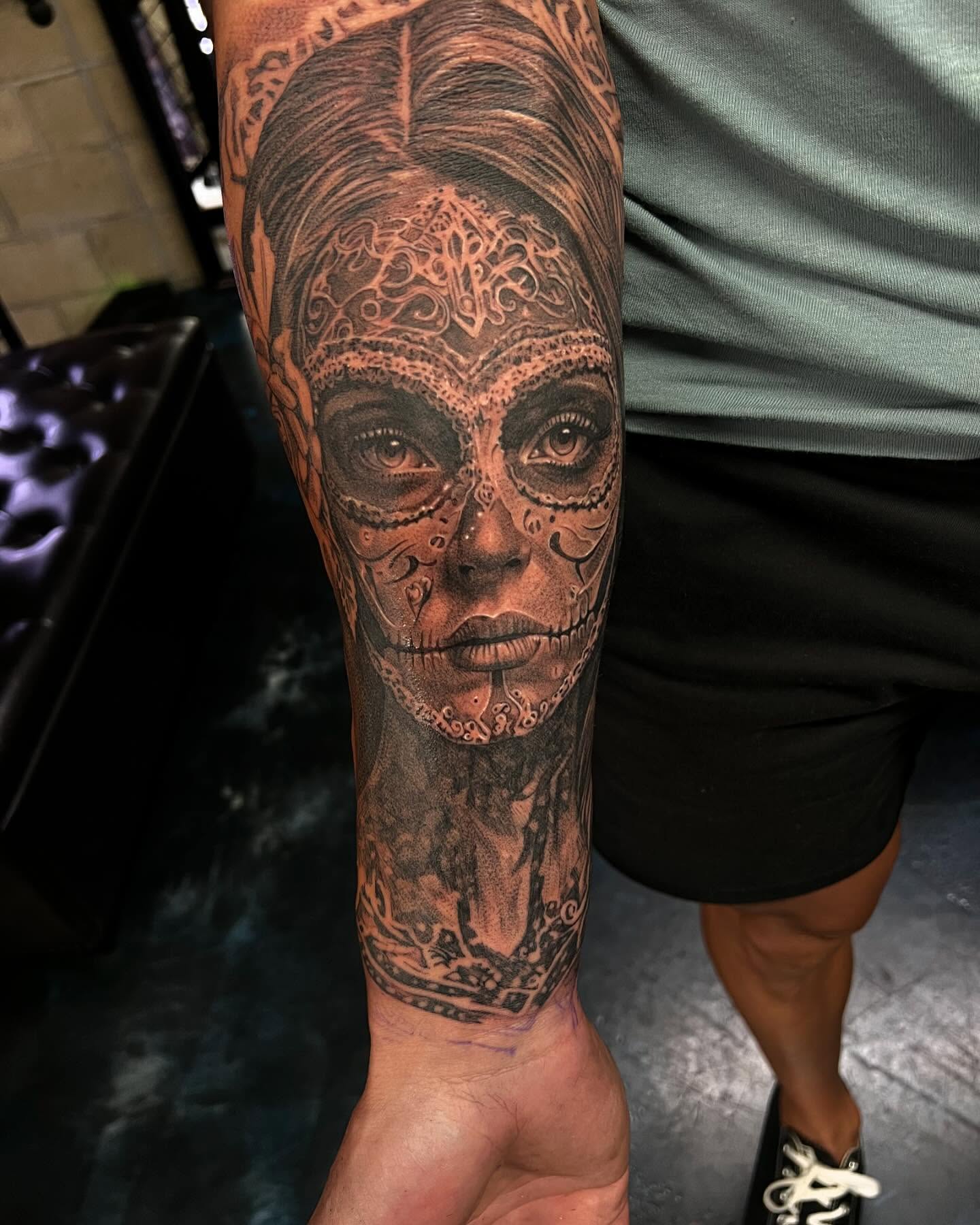 Sugar skull realism tattoo on the forearm by Creeper tattoo
