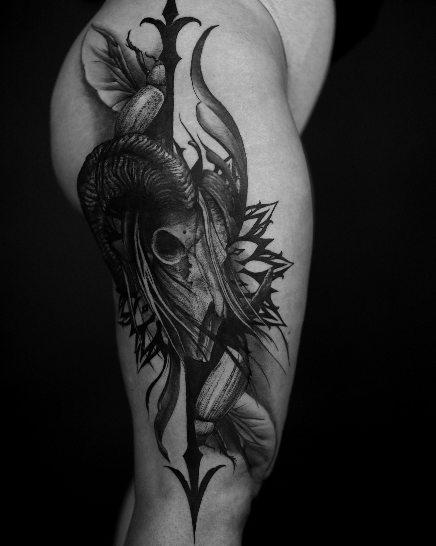 Ram skull and trident dark realism tattoo on the thigh by ➕d U S T I N C H A R L e S➕, Seattle, Washington