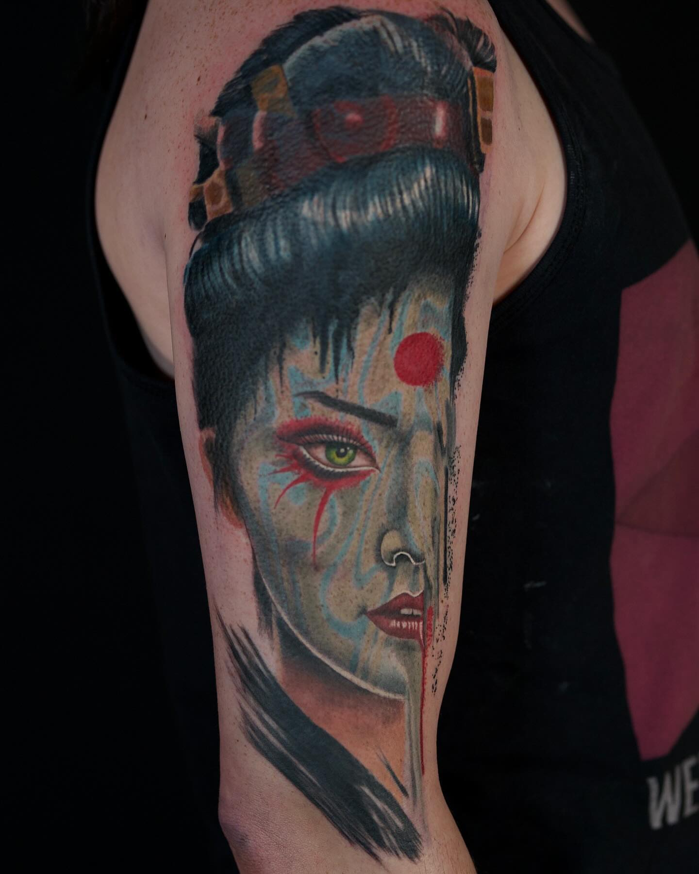 Geisha realism tattoo on the forearm by Chris Lochbihler