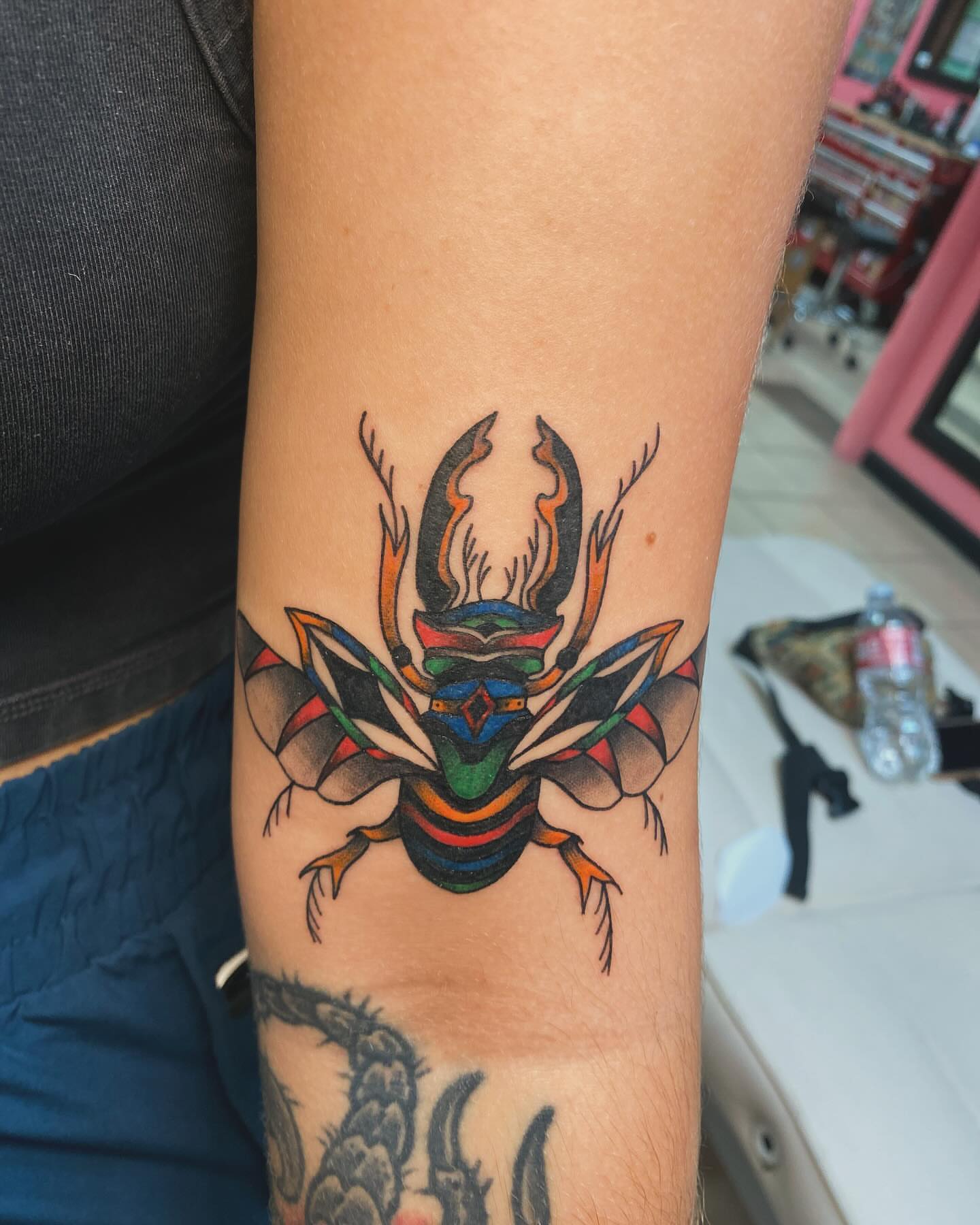 Insect American traditional tattoo on the forearm by Drew