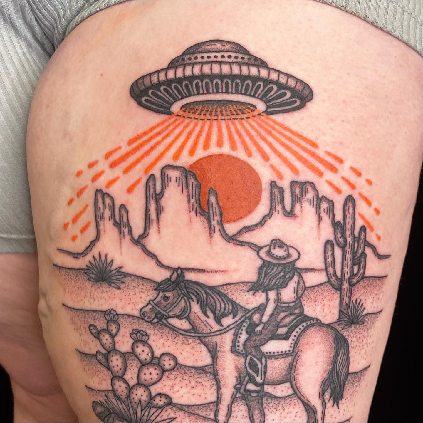 Desert landscape with UFO dotwork tattoo on the thigh by Krista - Tattoo Artist