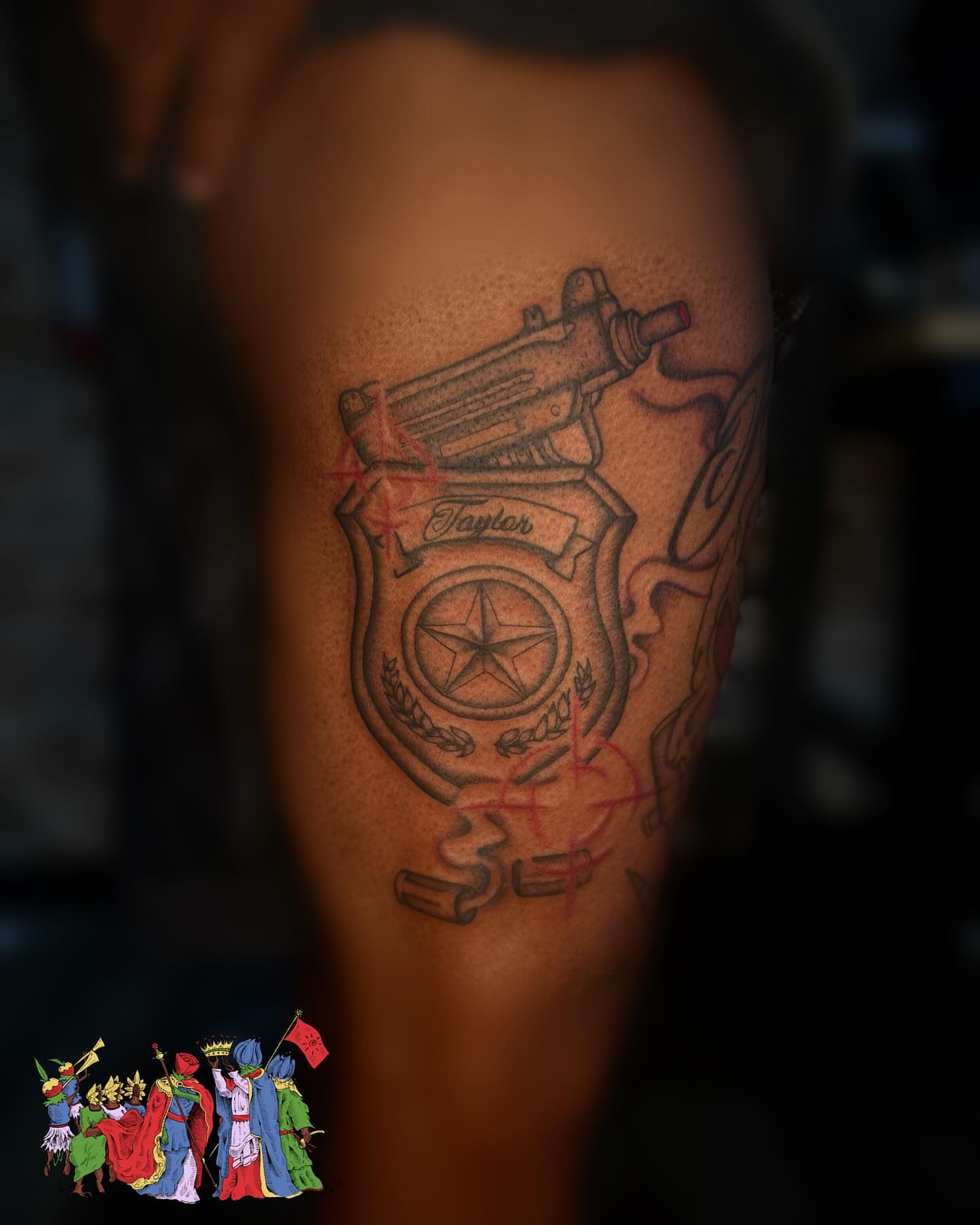 Gun and shield black and grey tattoo on the thigh by Marques Neal