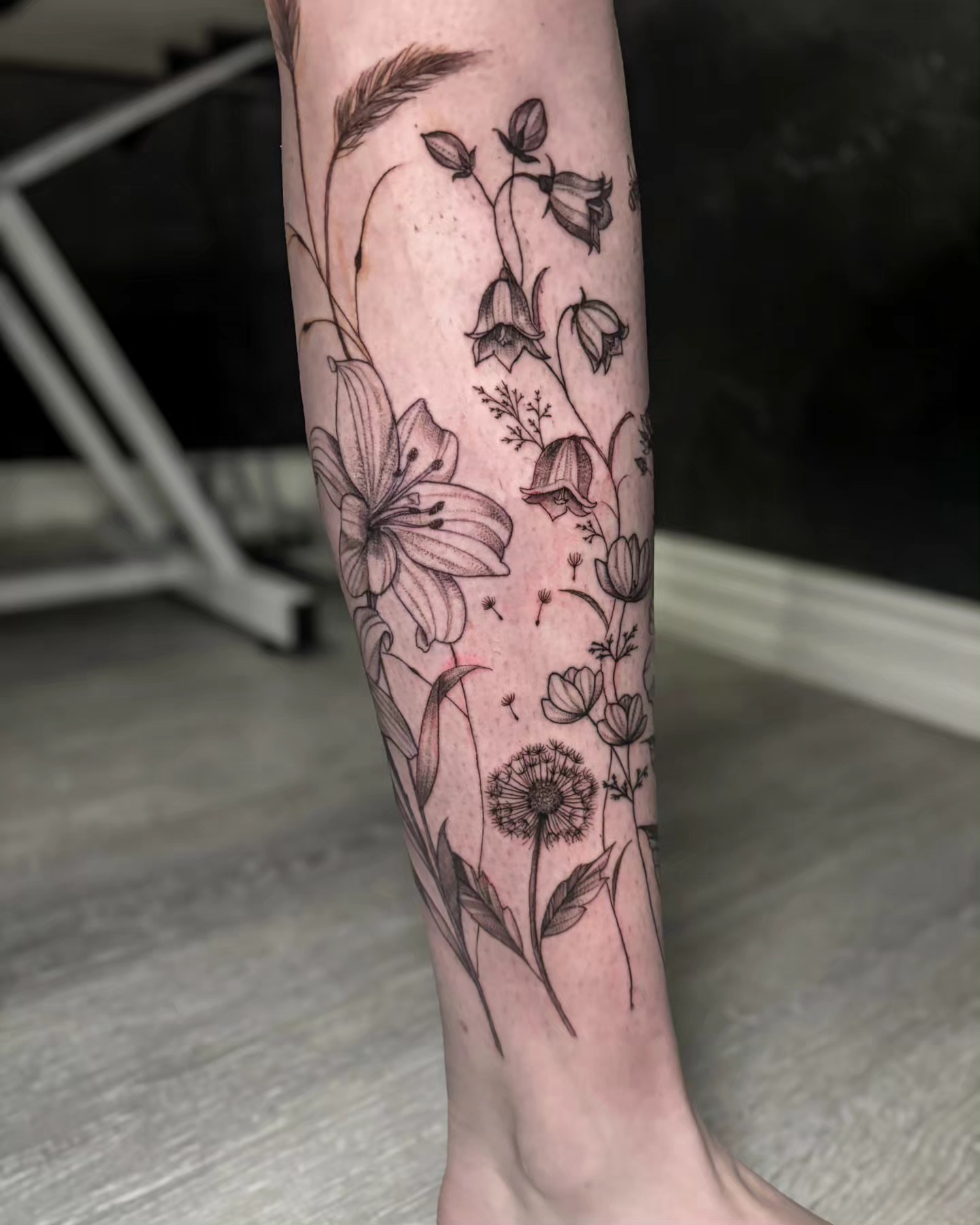 Floral arrangement black and grey tattoo on the forearm by Utah Tattoo Artist