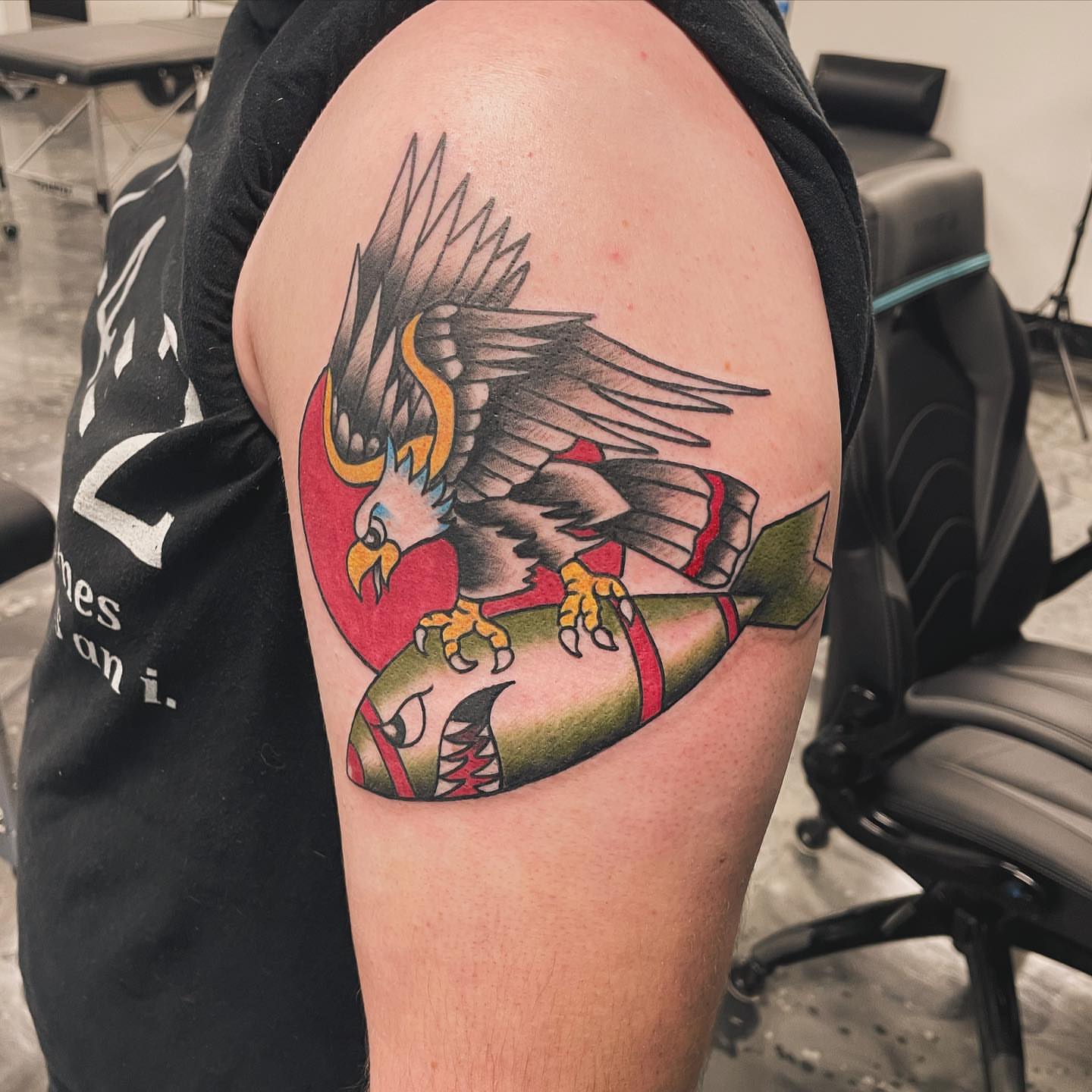 Eagle American traditional tattoo on the shoulder by Brandon Anderson