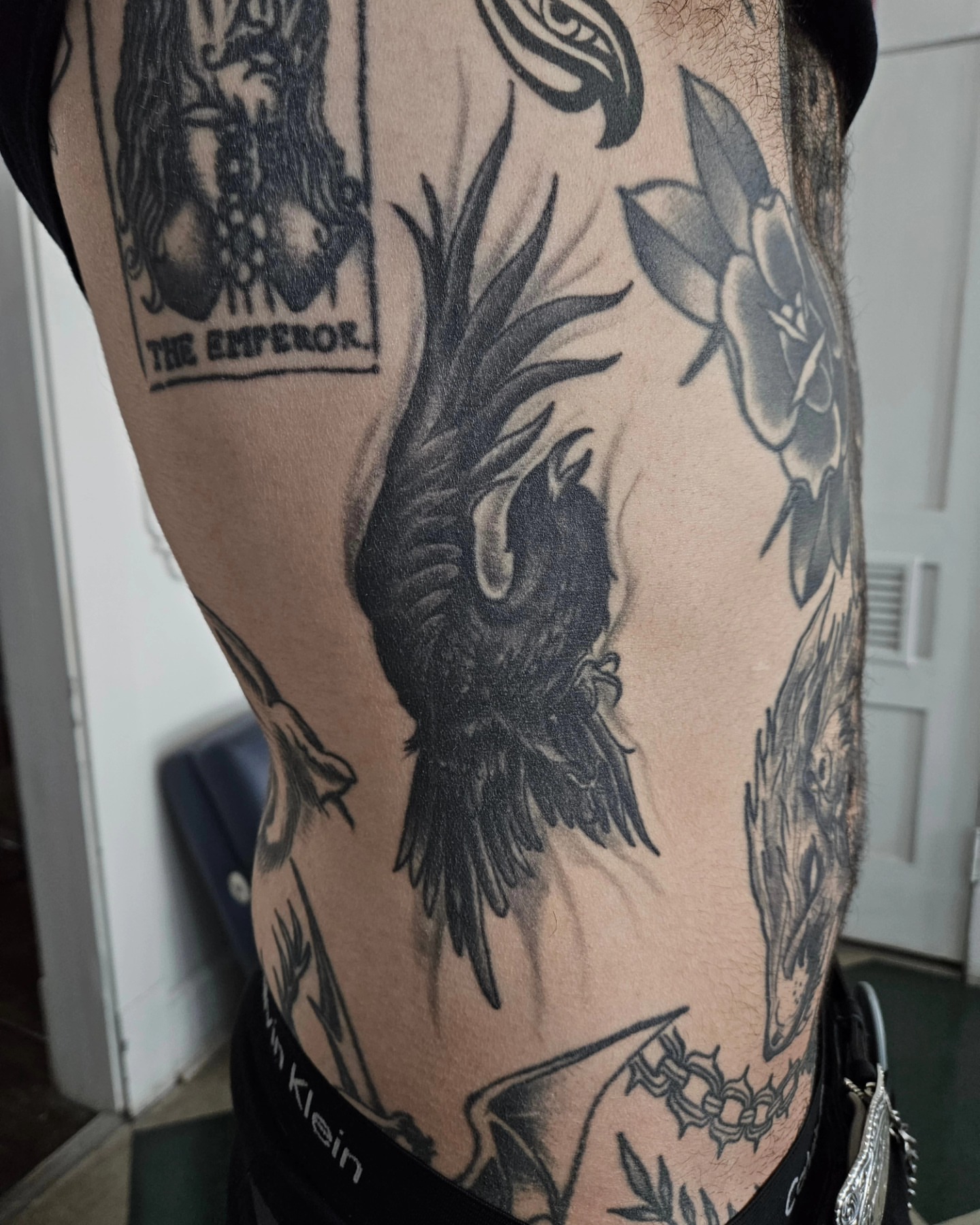 Crow realism tattoo on the thigh by David Nash, Evansville, Indiana