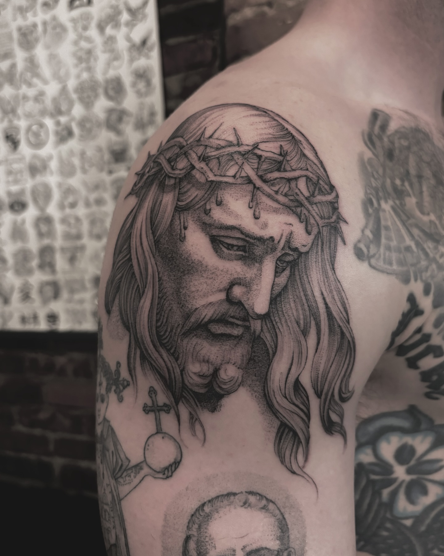 Jesus Christ realism tattoo on the shoulder by Jake Hodson, Nashville, Tennessee
