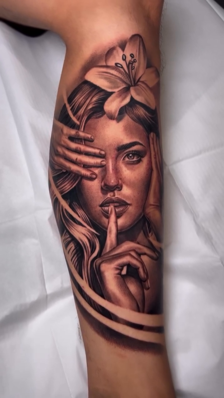 Woman with finger to lips realism tattoo by BJ