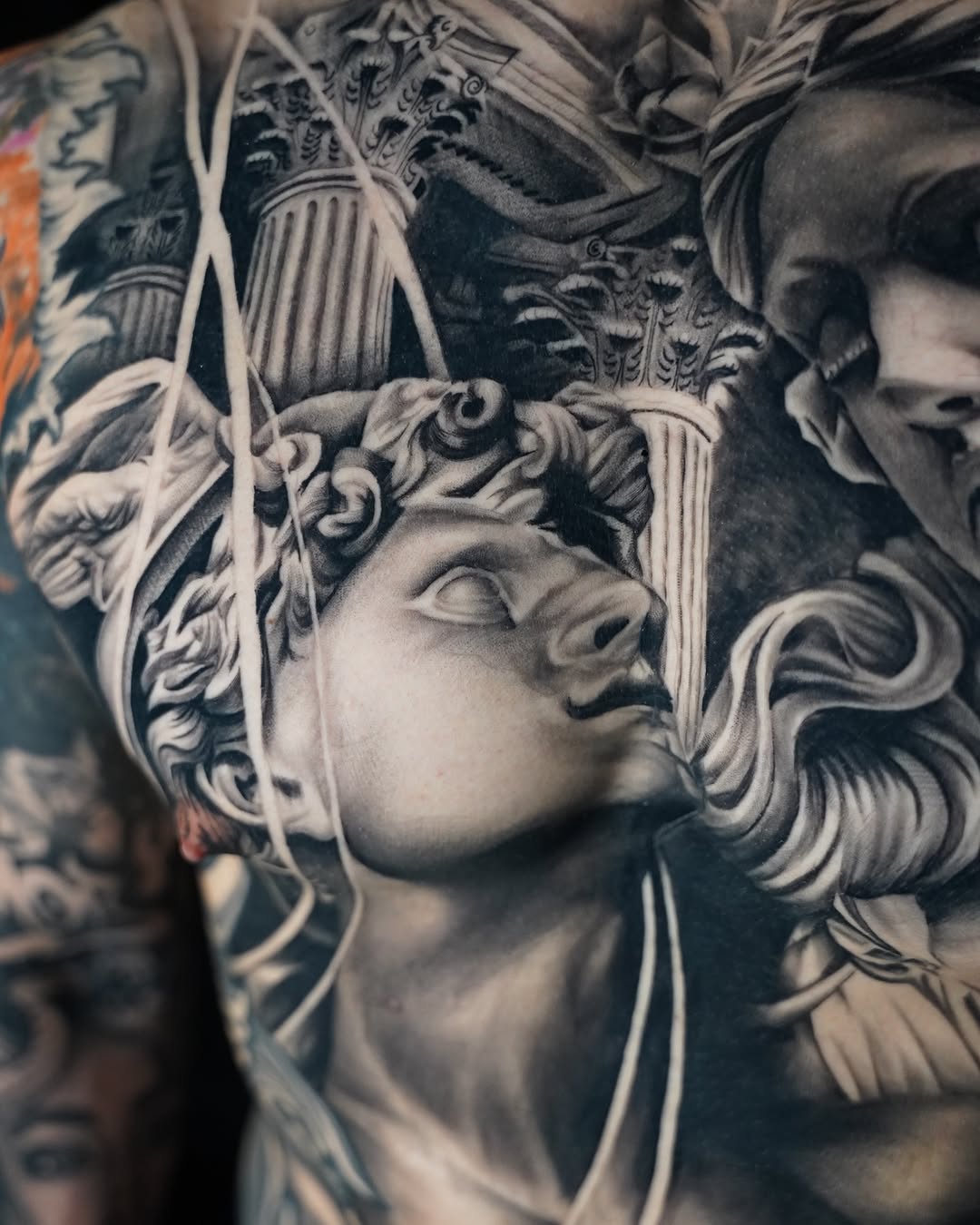 Tattoo by @heavyhitterbam — realism, black_and_grey