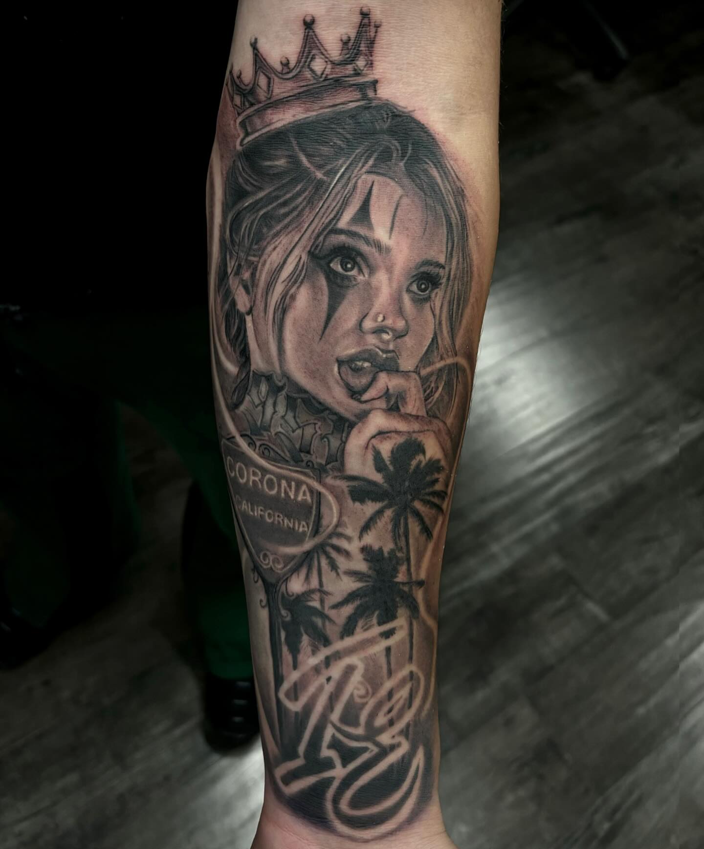 Girl with crown realism tattoo on the forearm by Jayden A