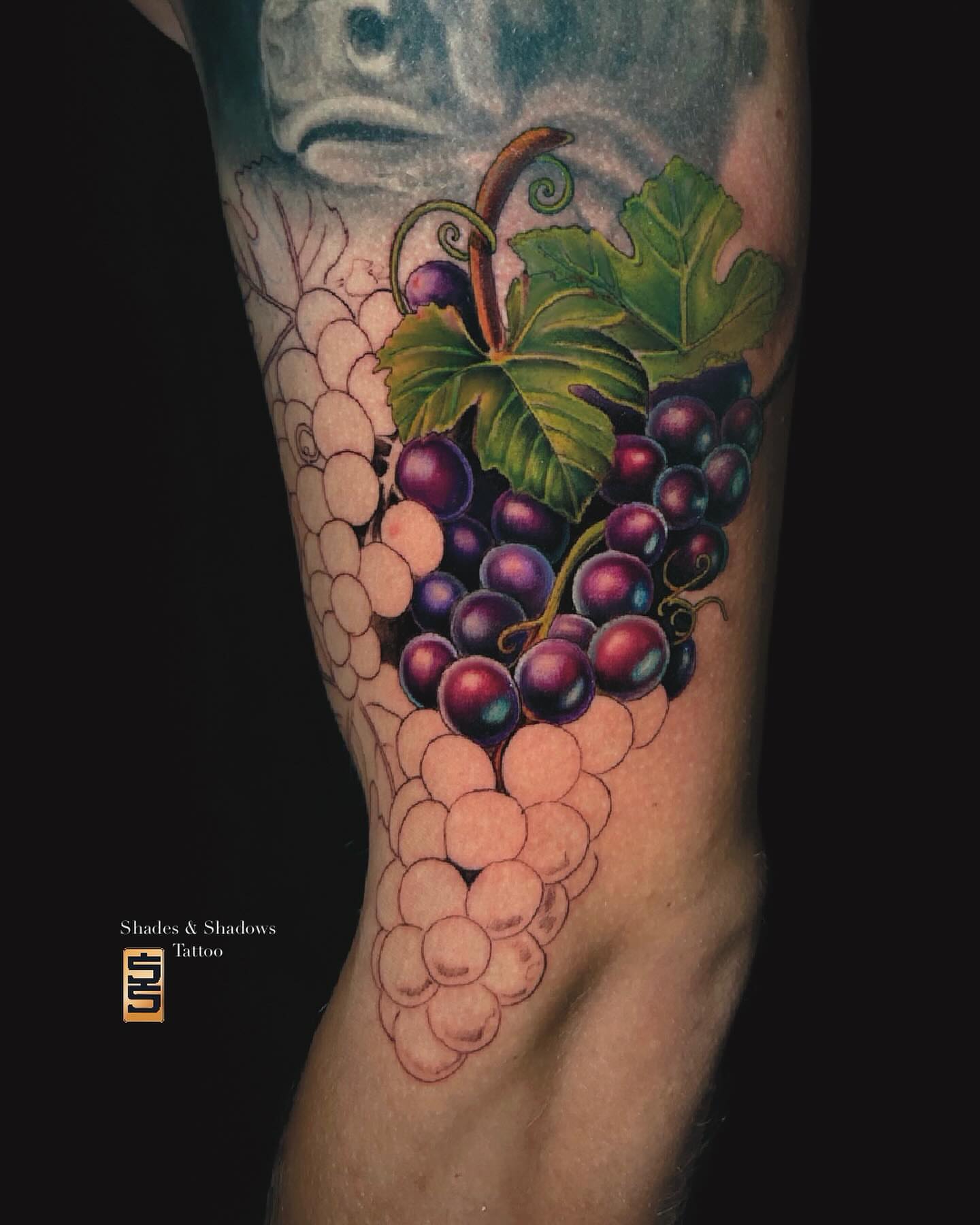 Grapes realism tattoo on the forearm by Austin Tattoo Artist