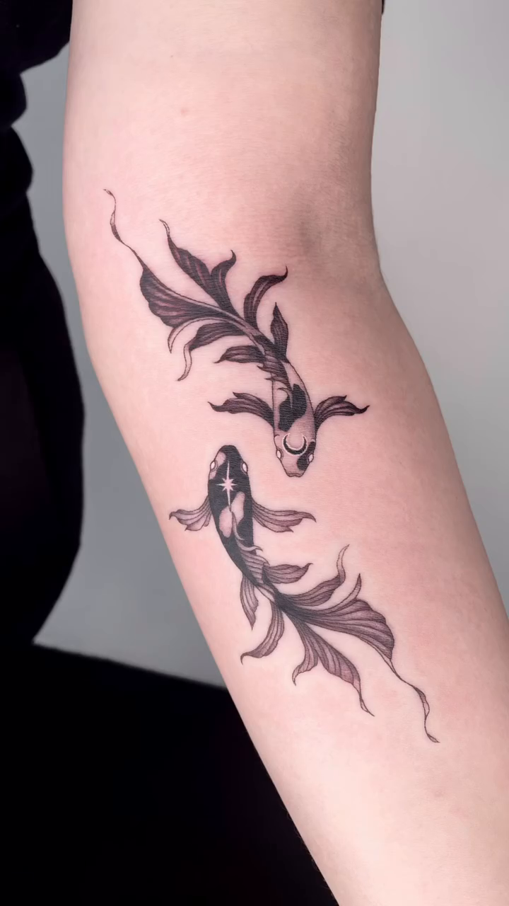 Two koi fish japanese irezumi tattoo by LA tattoo