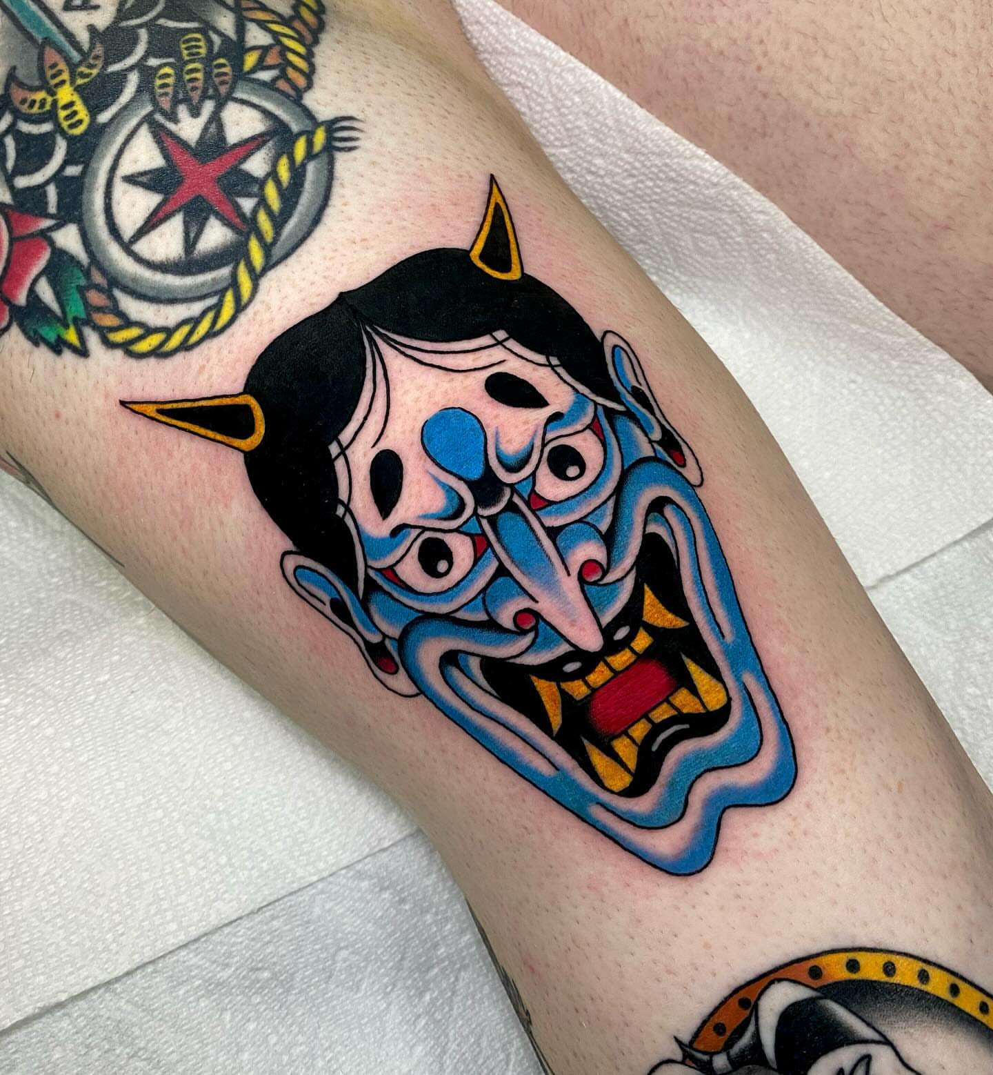 Demon mask American traditional tattoo on the forearm by Justin R. Mitchell, Fort Worth, Texas