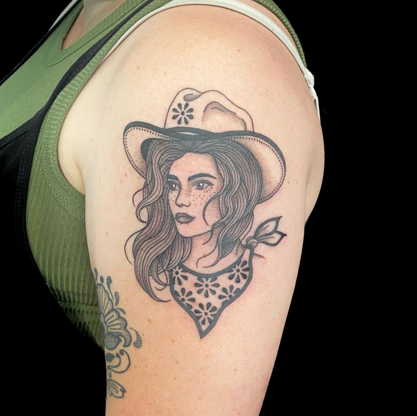 Cowgirl portrait realism tattoo on the shoulder by Krista - Tattoo Artist