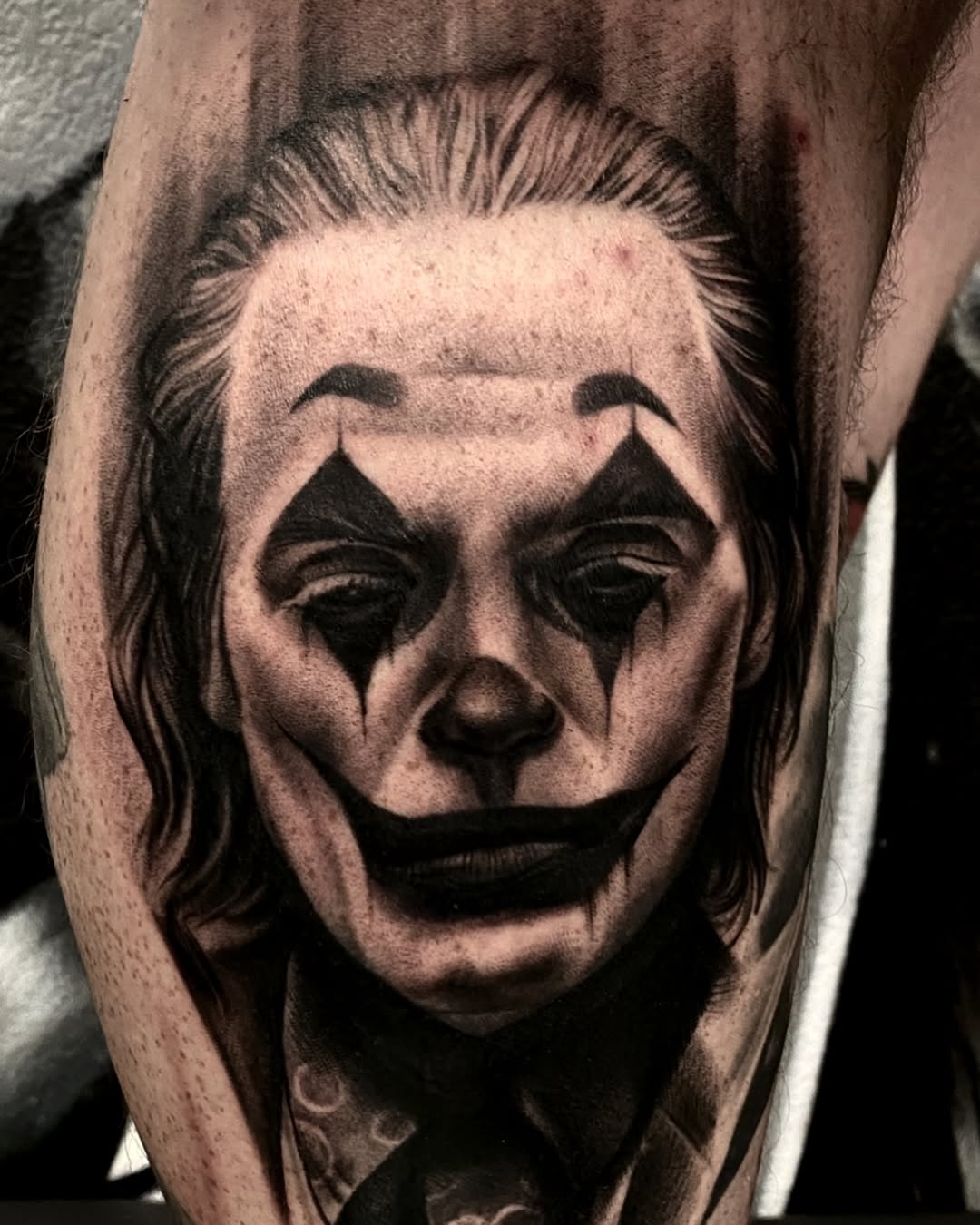 The Joker portrait realism tattoo on the forearm by Las Vegas tattoo Artist