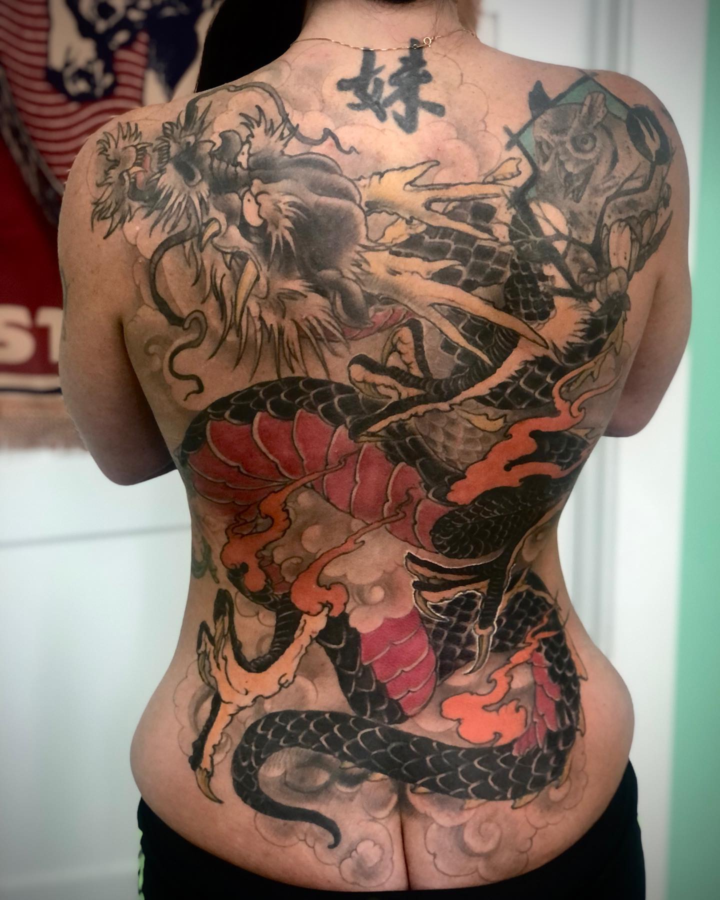 Dragon and phoenix japanese irezumi tattoo on the back by Alec Bauer