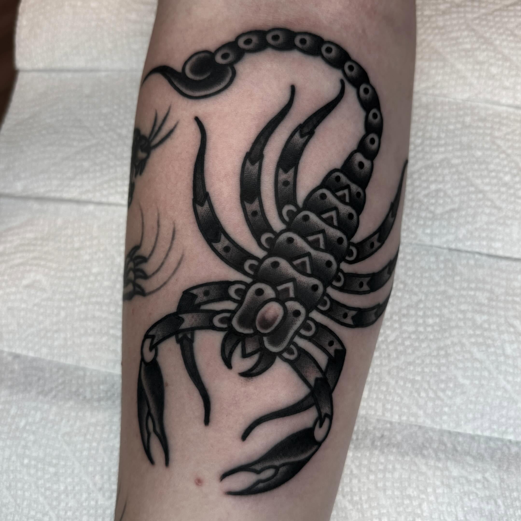Scorpion black and grey tattoo on the forearm by John Lemon