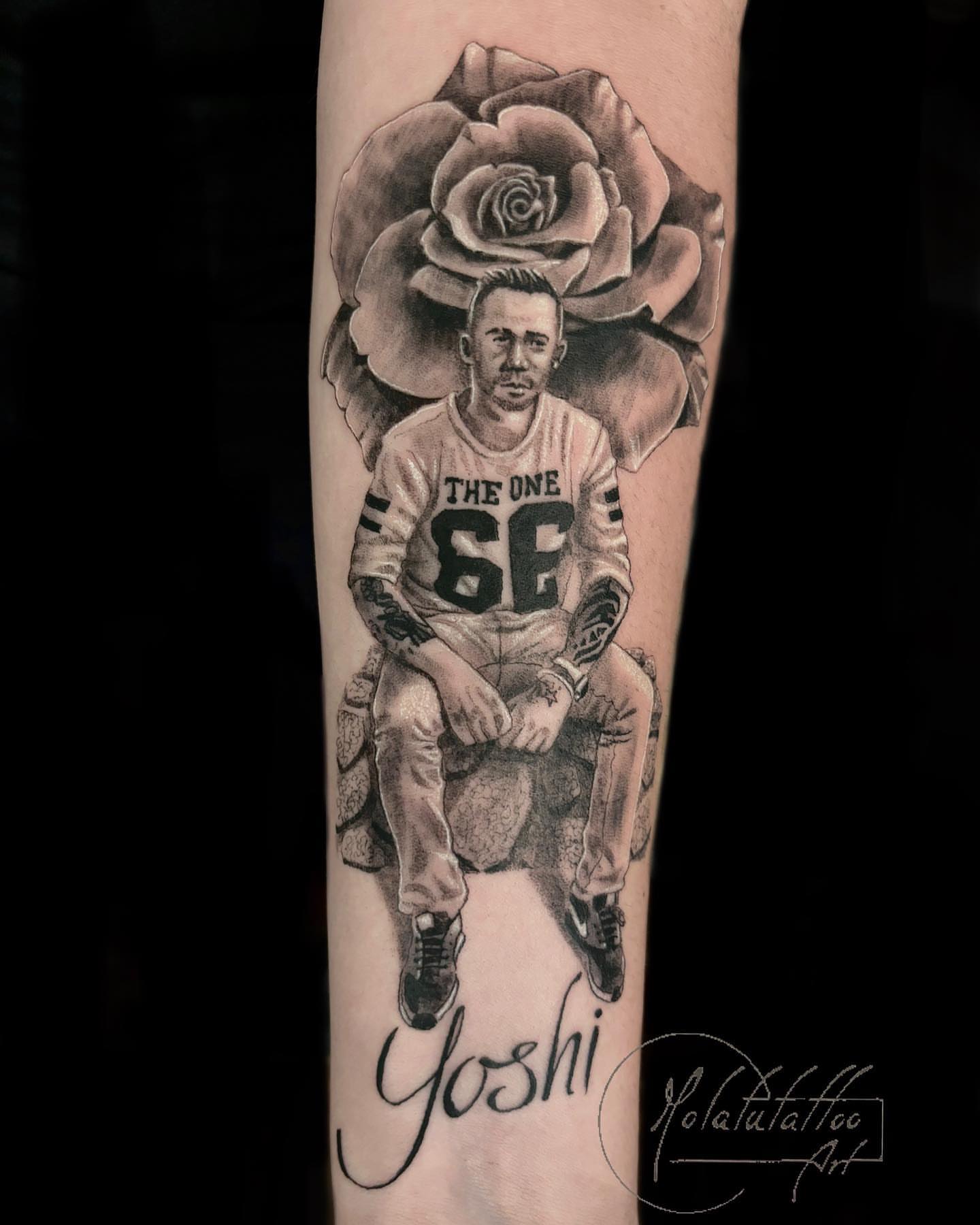 Football player realism tattoo on the forearm by Molatutattoo