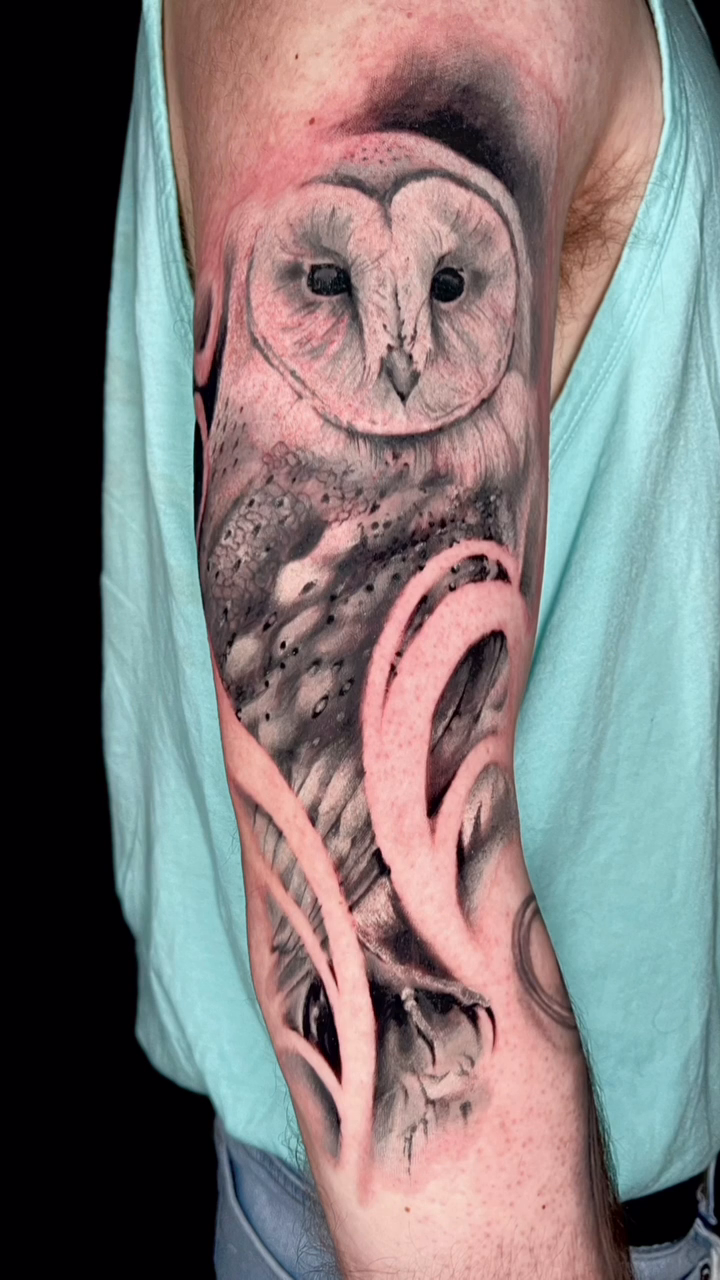 Barn owl with abstract elements realism tattoo by Travis Thorpe